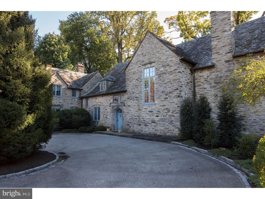 This exquisite 1925 French Normandy style home, which was designed by renowned architect Robert McGoodwin, is offered for sale for the first time in over 50 years. The stone residence with slate roof and three fireplaces features a gracious, center entry hall, step down living room and adjoining solarium, formal dining room, large eat in kitchen/breakfast room with a Viking cooktop, double wall ovens and Subzero refrigerator/freezer, pantry, mudroom, powder room and attached garage. A beautiful staircase to the second floor leads to a  master bedroom and bath, 4 additional bedrooms and 2 baths. Multiple sets of French doors open to lovely flagstone terraces overlooking 1.34 acres, highlighting exceptional, mature landscaping and tree canopy, creating an extremely private setting within walking distance to Chestnut Hill, transportation and the Wissahickon trails. There is a Chestnut Hill Historical Society Conservation Easement in Deed.