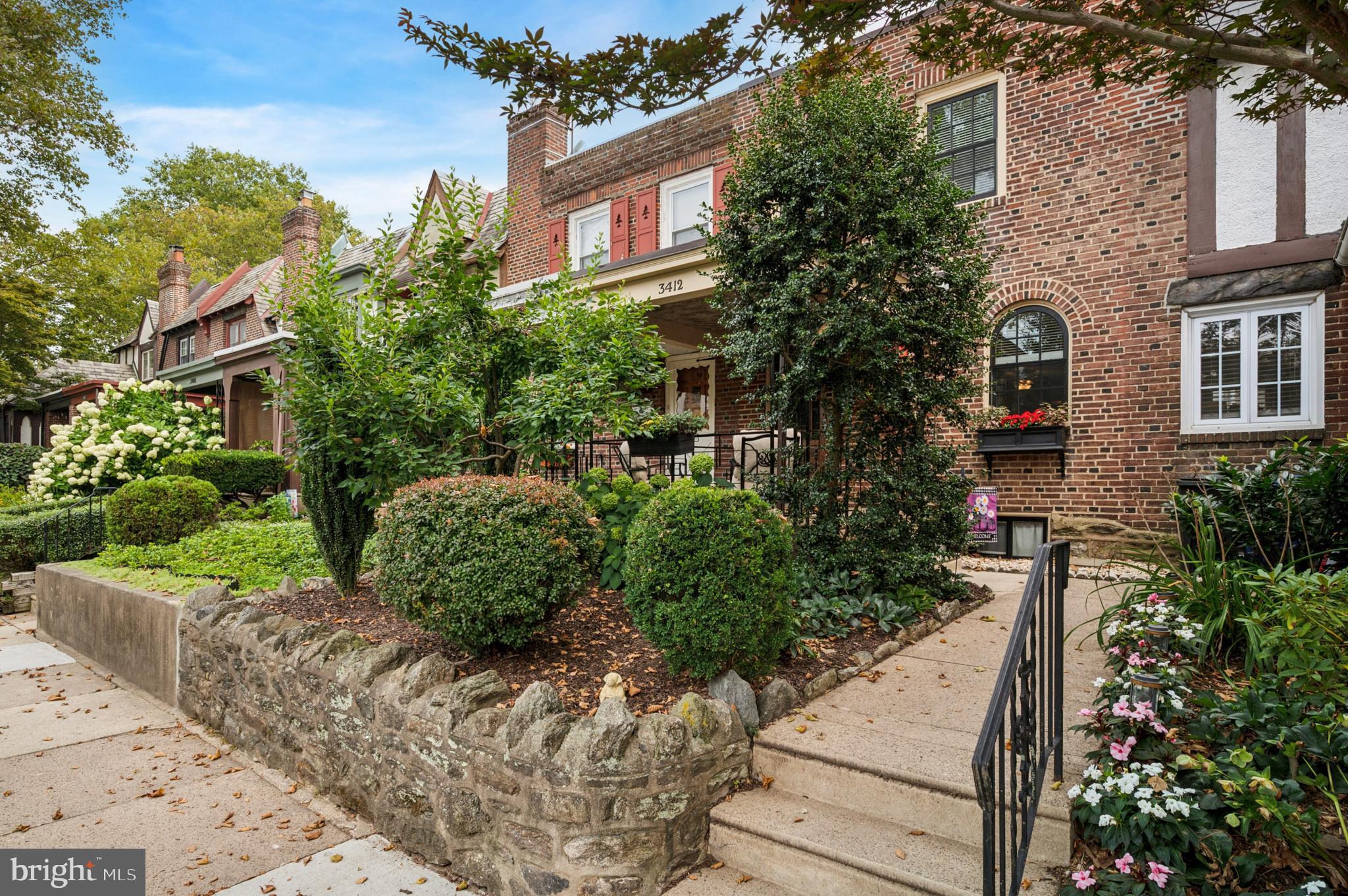 Welcome to 3412 West Queen Ln in the Tudor East Falls Historic District of Philadelphia. This captivating home is perfectly positioned on a quiet, wide street known for its lush, tree-lined beauty. This special residence offers a harmonious blend of classic charm and modern amenities, making it a haven for those who appreciate both style and comfort. The home boasts modern central air conditioning for year-round comfort.
Step through the breezy classic front porch where you will enjoy your morning coffee and evening conversations. The view of the tree-lined street is one-of-a-kind as you greet your neighbors and enjoy the gardens and scenery. Enter the front door to find original hardwood floors that beautifully complement the home's historical character. A formal dining room awaits your dinner parties, including the original stunning stained glass window and brand new solid wood windows, including a custom rounded front window which lets in ample natural light. Head into the updated kitchen which is a culinary dream featuring soapstone countertops and stainless steel appliances, including all new refrigerator, range, microwave and dishwasher. There is also access to the side porch, perfect for your summer barbecue.
Head up the beautiful wooden staircase to find the home's 3 inviting bedrooms and a tastefully updated full bathroom. Original hardwood floors are exposed throughout the second floor.
Practicality meets convenience with a spacious basement(7.5' ceilings if you choose to finish the space), the laundry facility, an attached garage, and extra off-street parking via the back alley. This residence is not just a home but a lifestyle, offering the perfect setting for both relaxation and entertaining.
The convenience of East Falls is legendary. Convenient to Center City, Chestnut Hill, the Montgomery County suburbs and public transportation, just a block from the Septa train. There are so many area attractions, just a few are Kelly Drive, Wissahickon Park, McMichael Park, Inn Yard Park, McDevitt Recreation Center and Wissahickon Brewing, LeBus and more!!
Don't miss the opportunity to experience the charm and comfort of this historic Philadelphia gem.