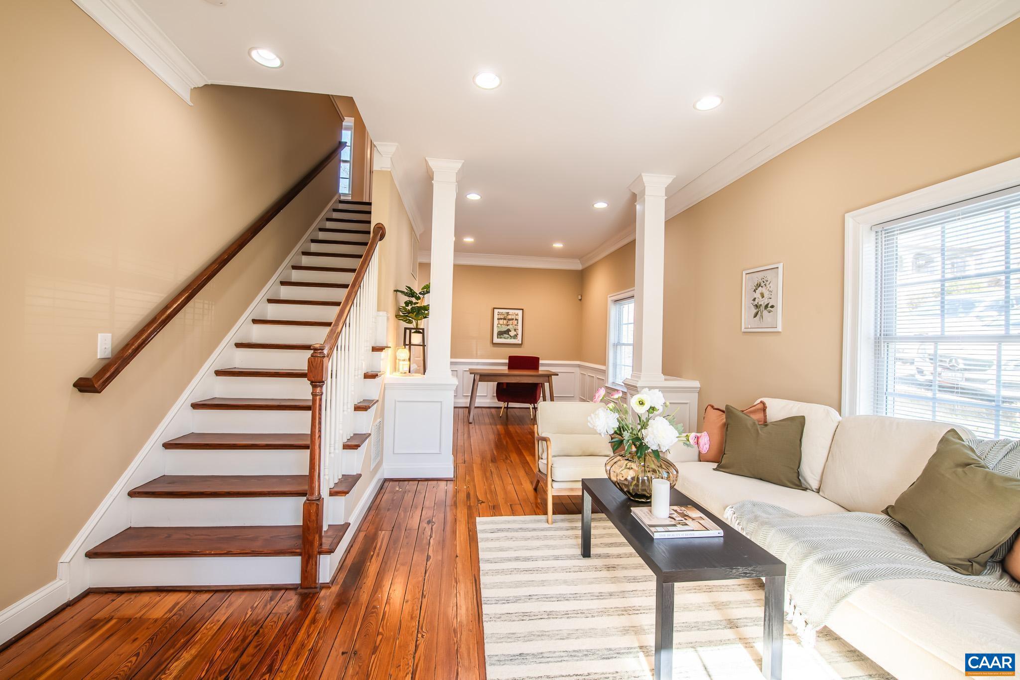 Unique Farm house styled home in prime location just 1 mile from the University of Virginia Hospital, Downtown Mall, or Wegman's shopping center! Featuring original hardwood floors and an expansive floorpan, this home has everything you need to make your own. This home was thoughtfully renovated in 2005 and all major systems were replaced and updated. There is a bright and open living room adjacent to the kitchen and a bedroom and full bathroom on the first floor, along with three additional bedrooms upstairs. The bedroom on the main level could also be utilized as a home office/study or as a main floor primary with attached full bathroom.