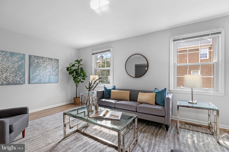 This spacious, freshly painted townhome in Alexandria's Seminary Heights neighborhood offers modern updates throughout, including new flooring on main and lower levels, updated baths, and new light fixtures. The main level features a bright eat-in kitchen with crisp white cabinetry and newer stainless steel appliances, a separate dining area, and a sunlit living room perfect for relaxation and gatherings.

Upstairs, the primary bedroom boasts dual closets and an ensuite bath with a tub-shower combo, while the second bedroom also features two closets and its own ensuite with a tub-shower and single vanity.

The versatile lower level includes a bonus room that can serve as a third bedroom, home office, or fitness room, along with a full bath, a large storage/laundry room, and a cozy family room complete with paneled walls, a brick wood-burning fireplace and wet bar. A sliding door leads to a private patio, perfect for entertaining.

Other features include a NEW HVAC in June 2024, NEW Roof in 2023, NEW Samsung washer and dryer, NEST thermostat, and electronic Schlage front door lock with keyless entry, assigned parking as well as numerous open spaces for guests.

Ideally located just minutes from Shirlington, Alexandria, and Falls Church shops and restaurants. A short stroll to Mark Center and easy commute to the Pentagon, Washington, D.C., and Amazon HQ2. This townhome blends convenience, comfort, and style.