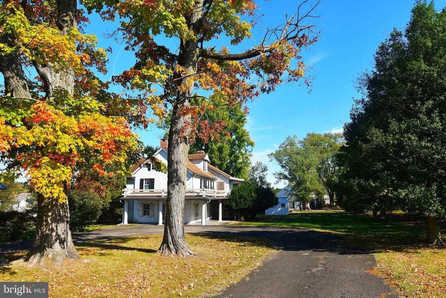 Historic charm & beauty captured in the circa 1815 Farmhouse nestled on a 2+ acre lot. Enjoy a large wrap around covered front porch.  Looking for a new owner to preserve the old world charm found in this historic home offering deep window sills, various built-in cabinetry, beamed ceilings, front & rear staircases & more. Large Living room accented with stone fireplace & beamed ceilings. Formal Dining room appointed with built-in cabinetry & a serving pass through to the kitchen. Eat-In Kitchen with beamed ceilings and a rear staircase to the upper 2nd floor too. Powder Room & Laundry Room on the 1st floor. 2nd Floor offers 4 bedrooms, 2 full baths & an office space as well. 3rd Floor with 2 additional rooms & a walk-in attic! Newer heater approximately 4 years old. 100 amp electrical service. Huge barn with attached carport provides great space for any car enthusiast, contractor, & hobbyist. Additional detached workshop too. Come see the limitless possibilities in this fantastic property. Located in the award winning Central Bucks School District. It's a great place to call "HOME"!! Property is an estate property and is being sold in complete "as-is" condition.