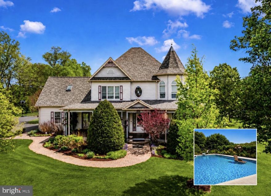 Welcome to a truly exceptional one-owner Victorian-style home, built to perfection and meticulously maintained, set proudly on a large private lot with neighboring land preserved in a conservation easement—ensuring lasting privacy and uninterrupted natural views.

From the moment you arrive, the paved driveway, commanding presence of the home, and breathtaking grounds set the tone. A classic wrap-around porch constructed of tongue and groove Spanish cedar decking  enhances the home’s timeless character, offering the perfect place to relax and take in the peaceful surroundings. The landscaping is nothing short of extraordinary, thoughtfully designed to offer beauty in every season. Mature plantings, abundant hydrangeas, and carefully layered gardens provide waves of color and texture from spring through fall, with evergreens and structural elements creating year-round visual interest. Pristine, manicured views surround the home on all sides, creating a serene, resort-like setting.

The in-ground pool is a stunning focal point, evoking the feel of a private vacation retreat and resort haven—perfect for relaxing or entertaining. Lush landscaping frames the pool area beautifully, enhancing both privacy and atmosphere.

Inside, the home is bright, airy, and beautifully appointed, featuring a dramatic two-story foyer, two staircases, and pristine real hardwood and Italian porcelain tile with radiant heating throughout. Finer details include custom beaded trim throughout, accented with plinth blocks, rosettes, inside and outside corners. The primary bedroom includes a relaxing seating area inside the turret.  Sun-filled living spaces flow effortlessly, including a charming sunroom—ideal for morning coffee or quiet evenings while overlooking the beautifully landscaped grounds.

The heart of the home is the top-of-the-line kitchen, showcasing a custom Palmer kitchen  and Hess cabinetry, upgraded countertops, and a large island with abundant storage—perfect for both everyday living and gatherings.  Laundry room includes vintage 1933 American Standard hanging wall skin with back mounted specialty faucet, shelving, Hess cabinetry. A laundry room shower offer convenience after a swim!  Enjoy the landscape from your 21x10 sunroom. There could be a potential fourth bedroom on the main level off the bathroom. A full basement offers extensive additional storage, while a detached two story workshop (24x36) with electric provides excellent flexibility for hobbies or projects, and second level could be made into an apartment.

Offering a peaceful rural setting while remaining conveniently close to everything, this home reflects exceptional craftsmanship, pride of ownership, and thoughtful design throughout. A rare opportunity to own a property where timeless architecture, resort-style outdoor living, and impeccable landscaping come together in perfect harmony.