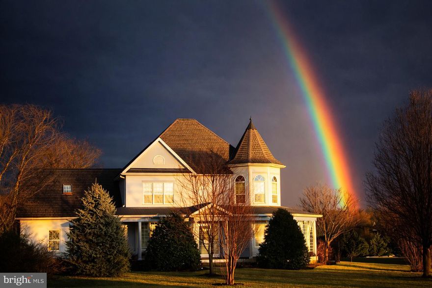 Welcome to a truly exceptional one-owner Victorian-style home, built to perfection and meticulously maintained, set proudly on a large private lot with neighboring land preserved in a conservation easement—ensuring lasting privacy and uninterrupted natural views.

From the moment you arrive, the paved driveway, commanding presence of the home, and breathtaking grounds set the tone. A classic wrap-around porch constructed of tongue and groove Spanish cedar decking  enhances the home’s timeless character, offering the perfect place to relax and take in the peaceful surroundings. The landscaping is nothing short of extraordinary, thoughtfully designed to offer beauty in every season. Mature plantings, abundant hydrangeas, and carefully layered gardens provide waves of color and texture from spring through fall, with evergreens and structural elements creating year-round visual interest. Pristine, manicured views surround the home on all sides, creating a serene, resort-like setting.

The in-ground pool is a stunning focal point, evoking the feel of a private vacation retreat and resort haven—perfect for relaxing or entertaining. Lush landscaping frames the pool area beautifully, enhancing both privacy and atmosphere.

Inside, the home is bright, airy, and beautifully appointed, featuring a dramatic two-story foyer, two staircases, and pristine real hardwood and ceramic floors with radiant heating throughout. Finer details include custom beaded trim throughout, accented with plinth blocks, rosettes, inside and outside corners. The primary bedroom includes a relaxing seating area inside the turret.  Sun-filled living spaces flow effortlessly, including a charming sunroom—ideal for morning coffee or quiet evenings while overlooking the beautifully landscaped grounds.

The heart of the home is the top-of-the-line kitchen, showcasing a custom Palmer kitchen  and Hess cabinetry, upgraded countertops, and a large island with abundant storage—perfect for both everyday living and gatherings.  Laundry room includes vintage 1933 American Standard hanging wall skin with back mounted specialty faucet, shelving, Hess cabinetry. A laundry room shower offer convenience after a swim!  Enjoy the landscape from your 21x10 sunroom. There could be a potential fourth bedroom on the main level off the bathroom. A full basement offers extensive additional storage, while a detached two story workshop (24x36) with electric provides excellent flexibility for hobbies or projects, and second level could be made into an apartment.

Offering a peaceful rural setting while remaining conveniently close to everything, this home reflects exceptional craftsmanship, pride of ownership, and thoughtful design throughout. A rare opportunity to own a property where timeless architecture, resort-style outdoor living, and impeccable landscaping come together in perfect harmony.