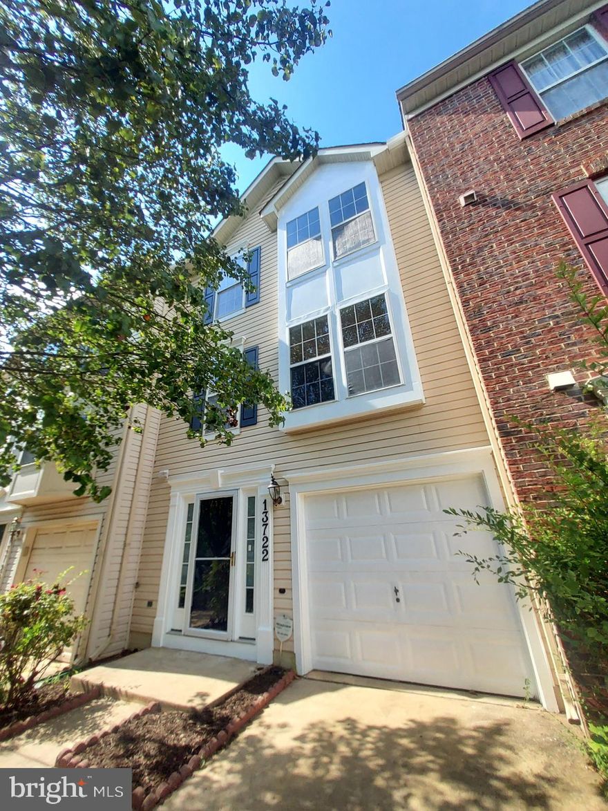 Rarely available very large townhouse, 3-levels all above ground, bright/ large bump-out rooms.  Multiple family rooms, garage & driveway.  Near transportation & shopping. Table space kitchen with island. Spacious master suite with walk-in closet, large master bath with soaking tub & separate shower. Newly finished walkout basement with a half bath, gas fireplace.  Newly surfaced deck. Backyard backs to the woods. No Smoking, Small Pets may be allowed case by case.