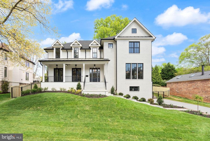 Located in the highly sought-after Chesterbrook Estates neighborhood, this exceptional residence by MR Custom Homes offers a rare blend of luxury, scale, and thoughtful design. Sited on a desirable 17,109 sq. ft. lot on a dead-end street, the home features over 8,223 finished sq. ft. of beautifully appointed living space with ELEVATOR SHAFT rough-in and 3 CAR GARAGE . Inside, an expansive dining room with dramatic wainscoting and oversized windows sets an elegant tone, complemented by a private library ideal for a home office and a sun-filled family room designed for comfortable everyday living and effortless entertaining. The gourmet kitchen is a true centerpiece, featuring high-end appliances, custom cabinetry, and generous prep and gathering space, seamlessly connecting to the breakfast area, screened porch, and expansive flagstone patio for exceptional indoor-outdoor living.
A main-level bedroom with a full en-suite bath provides ideal accommodations for guests or multigenerational living, while a dedicated wine room adds a refined touch for both entertaining and storage.
Upstairs, the luxurious primary suite serves as a private retreat with dual walk-in closets, a private office, and a spa-like bath. Three additional spacious bedrooms each offer en-suite baths. The lower level is designed for both relaxation and recreation, featuring a large recreation room with a  full wet bar, an exercise room, and an additional bedroom with a full en-suite bath—perfect for an au pair or extended-stay guests—along with abundant storage. 
A rare highlight is the combination of a two-car garage plus an additional one-car garage, offering ample parking and storage. Ideally located near major commuter routes, shopping and dining.  Only 1 traffic light to cross the Chain Bridge into DC!  Chesterbrook ES, Longfellow MS, McLean HS.