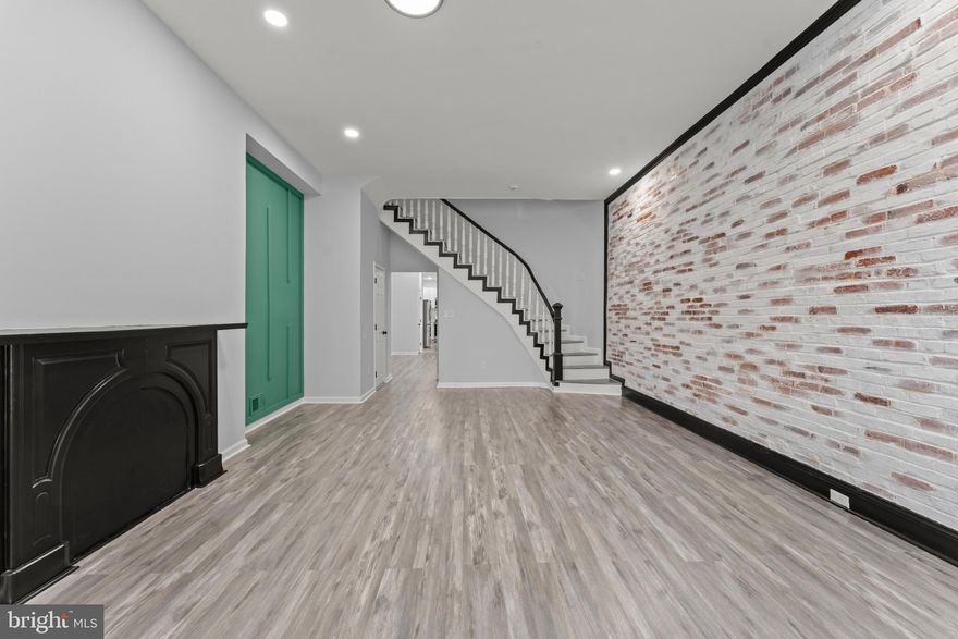 Welcome to 917 Edmondson Ave — a beautifully refreshed Baltimore rowhome offering modern comfort, classic charm, and spacious living in a convenient city location.

Step inside to find a bright, open main level with stylish brickwall,  accent fire place and flooring  withupdated finishes, and plenty of room to relax or entertain. The kitchen features contemporary cabinetry, generous counter space, and a layout ideal for both cooking and gathering.

Upstairs, you’ll find well-sized bedrooms filled with natural light, along with updated bathrooms designed for everyday comfort. A full unfinished basement  provides additional flexibility — perfect for storage, a workshop, or future expansion.

Outside, enjoy a private rear yard that’s great for outdoor dining, pets, or gardening. The home is located on a classic Baltimore block with easy access to commuter routes, public transportation, downtown amenities, local parks, and neighborhood shops.

This home is perfect for anyone seeking an affordable home with room to grow, 917 Edmondson Ave delivers exceptional value and convenience.

Schedule your tour today and see everything this charming city home has to offer.