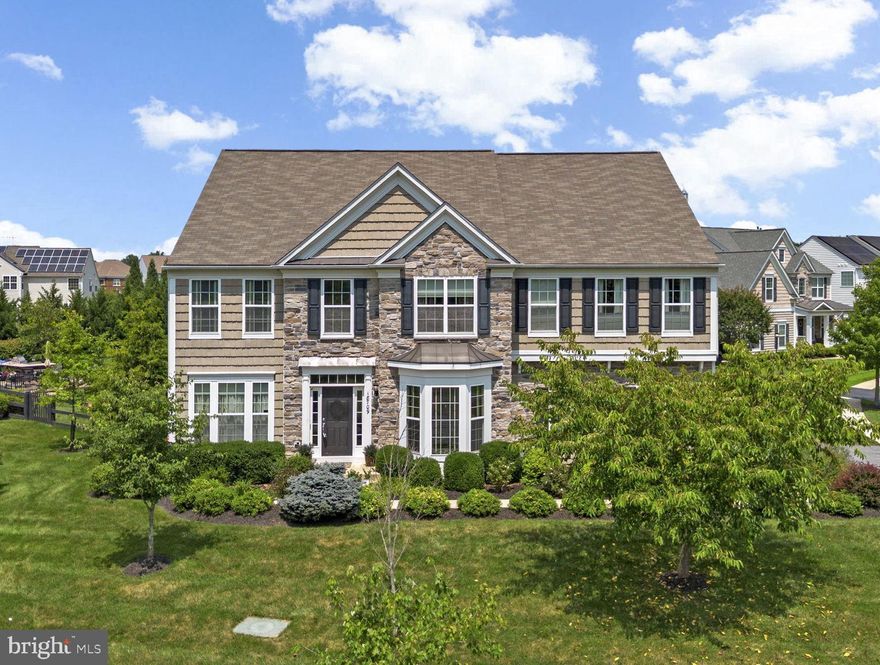 Welcome to this stunning Pulte-built home, tucked at the end of a quiet street that ends in a cul-de-sac! Upon arrival, you will notice the stone work and side-load garage, creating a grand yet inviting entrance to your home. Impeccable attention to detail when considering the low-maintenance landscaping along the front walk, with a mix of evergreen shrubs, perennials, and pollinator-friendly annuals. Inside, you will notice the ideal layout, which features a formal two-story entry, with gleaming hardwoods that carry you through the foyer to the formal living and dining spaces. Don't miss the home office as you walk in! The butler's pantry leads into the kitchen, which is open to the family room, offering sight lines to the gorgeous backyard. Upstairs, you will find four spacious bedrooms and three full bathrooms. The primary suite is simply exquisite, featuring a large bedroom area that steps up to a sitting area, complete with built-in bookshelves, and a two-sided fireplace. The fully appointed en-suite bath is complete with a soaker tub, walk-in shower, and grand walk-in closet. In the basement, you will find an entertainer's paradise! Open and inviting with space for a home office/home gym/theatre area, and ample storage that wraps around the back! The backyard is truly a slice of paradise, featuring a stone patio and privacy trees that surround the fenced yard. You won't want to miss this one, so schedule your private showing today!