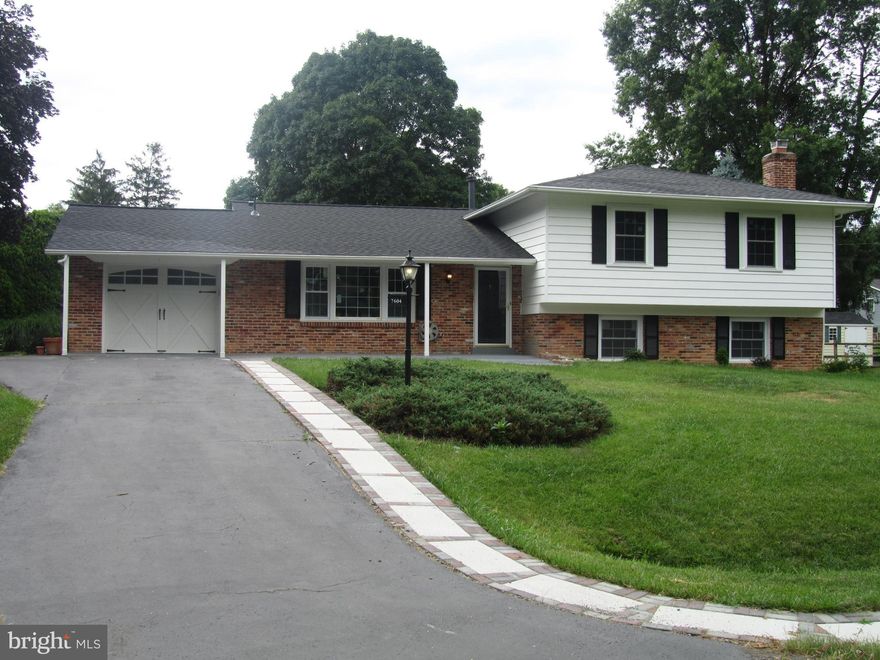 Great Home, Location, Community and Lot.  Large 4-Level Split Level on a Cul-de-sac, One-Car Garage with Parking Pad and Driveway Which Parks 4-Cars.  4 Bedrooms up and one down.  Cedar Closet, New Pergo-Like Floors, New Windows, Freshly Painted, Rear Cement Patio and Front Porch, Large Yard Nicely Landscaped with Shrubs, Walk-In Closet, Sliding Glass Doors off the Dining Room Leads to Backyard, New Roof, Florescent and Recessed Lighting.  Lower Level Door to Side/Backyard, Recreation Room with Full Wall Brick Woodburning Fireplace with Slate Base and Wood Mantle with Screen.  Front Walkway.  Updated "L" Shaped Eat-In Kitchen with Gorgeous Quartz Counters and Tile Backsplash, New Stainless Steel Appliances Including a Built-In Microwave Oven, New Cabinets and a Pantry Closet.  Large Kitchen (Refrigerator "as is") and Living Room Windows Keeps this House Nice and Bright.  Gas Heat and Hot Water.  **Contract Fell Thru**