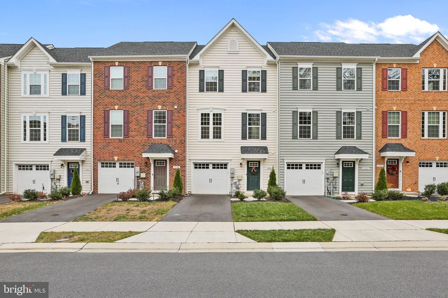 This charming townhome delivers 3 fully finished levels! The entry level features an attached 1-car garage, half bath, additional room walking out to the rear yard.  The main level features an open-concept kitchen and dining room area that flows seamlessly to your living space with a half bath.  Let's not forget the deck which is the perfect place to entertain family and friends.  The upper level features the primary bedroom, two additional bedrooms and two full baths.  This home has a bathroom on every level, tankless water heater, and upper level laundry area.  Other features include: smart thermostat, Arlo video doorbell, and is an Energy Star House.