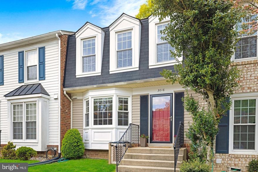 Charming townhome in sought after Lake Ridge. Access to trails, pools, tennis courts, boat ramp, playgrounds and other community amenities. This townhome has been beautifully maintained and has a warm and welcoming atmosphere with updates throughout and plenty of natural light throughout the home. Granite kitchen countertops, stainless steel appliances, luxury stain and scratch resistant flooring on main level, tile in bathrooms and recently expanded basement area and updated bathrooms with new vanities. Basement also has extra closet space, laundry/storage space along with a full bathroom. Back deck backs up to woods and hiking trails.  The rear yard has been updated and is low maintenance and has a privacy fence. 2 reserved parking spaces with open spaces/ample street parking for guests.  Great location to commuter routes both north and south.  Don't miss this one!