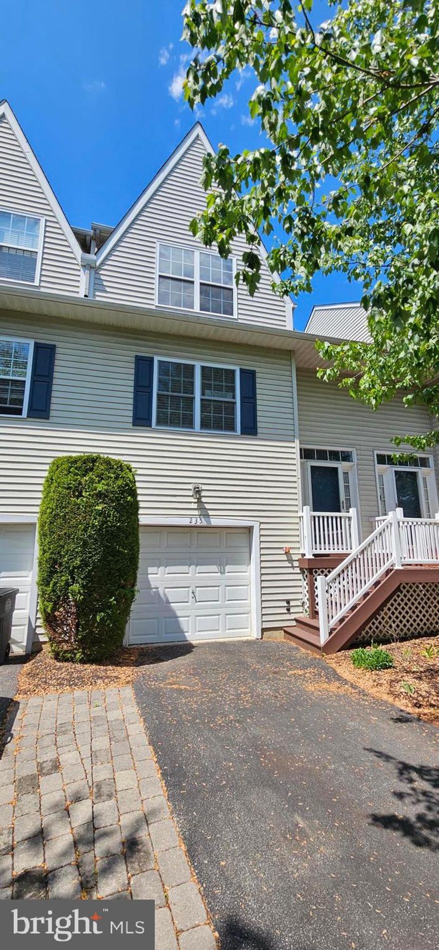Welcome to 235 Buchanan Court, a 3‑bedroom, 2.1‑bath townhome in the popular Main Street Village neighborhood of Downingtown. Within walking distance to so much shopping and dining. With a bright open layout and flexible living spaces, this home offers comfort, function, and a convenient location. The main level features a kitchen with white painted oak cabinetry, stainless steel appliances, gas cooking, luxury vinyl flooring, and room for a table. The kitchen opens to the dining area and a spacious living room with a gas fireplace, creating an easy flow for everyday living. Sliding glass doors lead to an oversized deck, providing a great outdoor space to relax or entertain. A powder room completes the first floor. Upstairs, you’ll find three well‑proportioned bedrooms, including a primary suite with a walk‑in closet and private bath. Two additional bedrooms offer generous closet space, and laundry is conveniently located on the second floor. The lower level adds valuable additional living space, featuring a family room, two large storage closets, sliding glass doors to a patio, and direct access to the garage. An oversized one‑car garage and driveway provide parking and storage flexibility. Recent improvements include HVAC (2018), A/C (2017), kitchen flooring (2022), gas line and gas stove (2021), refrigerator (2021), dining room wainscoting (2021), powder room update (2021), carpet and padding (2020), and neutral interior paint (2020). Ideally situated close to Kerr Park, major roadways, and the train station, this home presents a solid opportunity in an established community all within the coveted Downingtown Area School District.