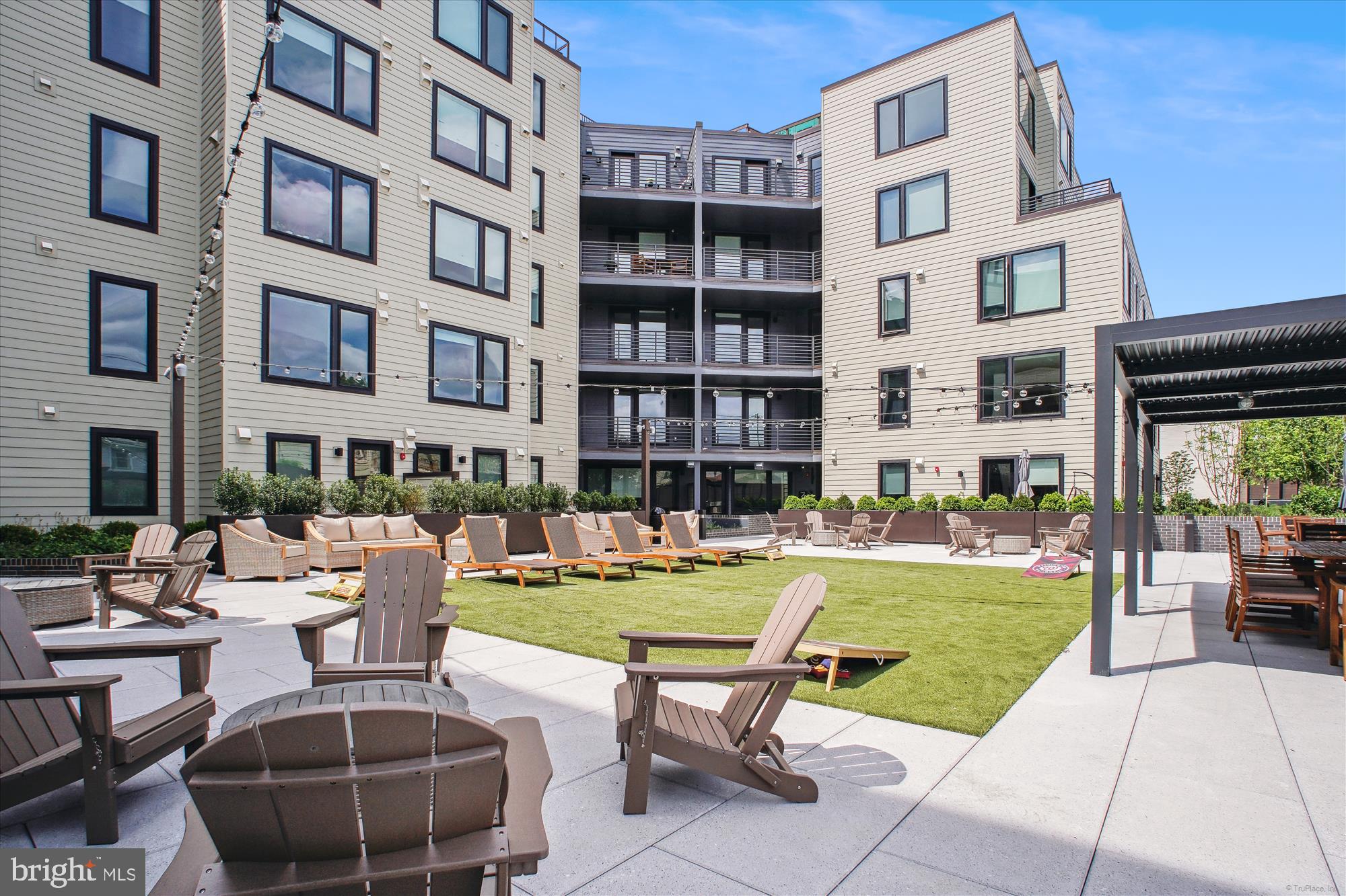 Live just two blocks from the Braddock Metro in this spacious 2-bedroom, 2-bath apartment at The Aidan, a boutique-style luxury building in Old Town Alexandria. With approximately 1,200 square feet, this home offers room to spread out and enjoy stylish city living with all the modern comforts.
Inside, you’ll find floor-to-ceiling windows, wide-plank flooring throughout, and a sleek kitchen equipped with Bosch stainless steel appliances and ample cabinet space. The open layout is designed to maximize natural light and create a bright, inviting atmosphere.
Included with the unit is an assigned garage parking space, conveniently located near the EV charger—perfect for electric vehicle owners or future-ready residents.
The Aidan features a full suite of amenities: an expansive rooftop terrace with grilling stations and skyline views, a serene courtyard with a yoga lawn, and a fully equipped fitness center.
You’re just minutes from local shops, dining, parks, and the Potomac River waterfront.
Don't miss your chance to live in one of Alexandria’s most sought-after communities— Check it out this weekend!