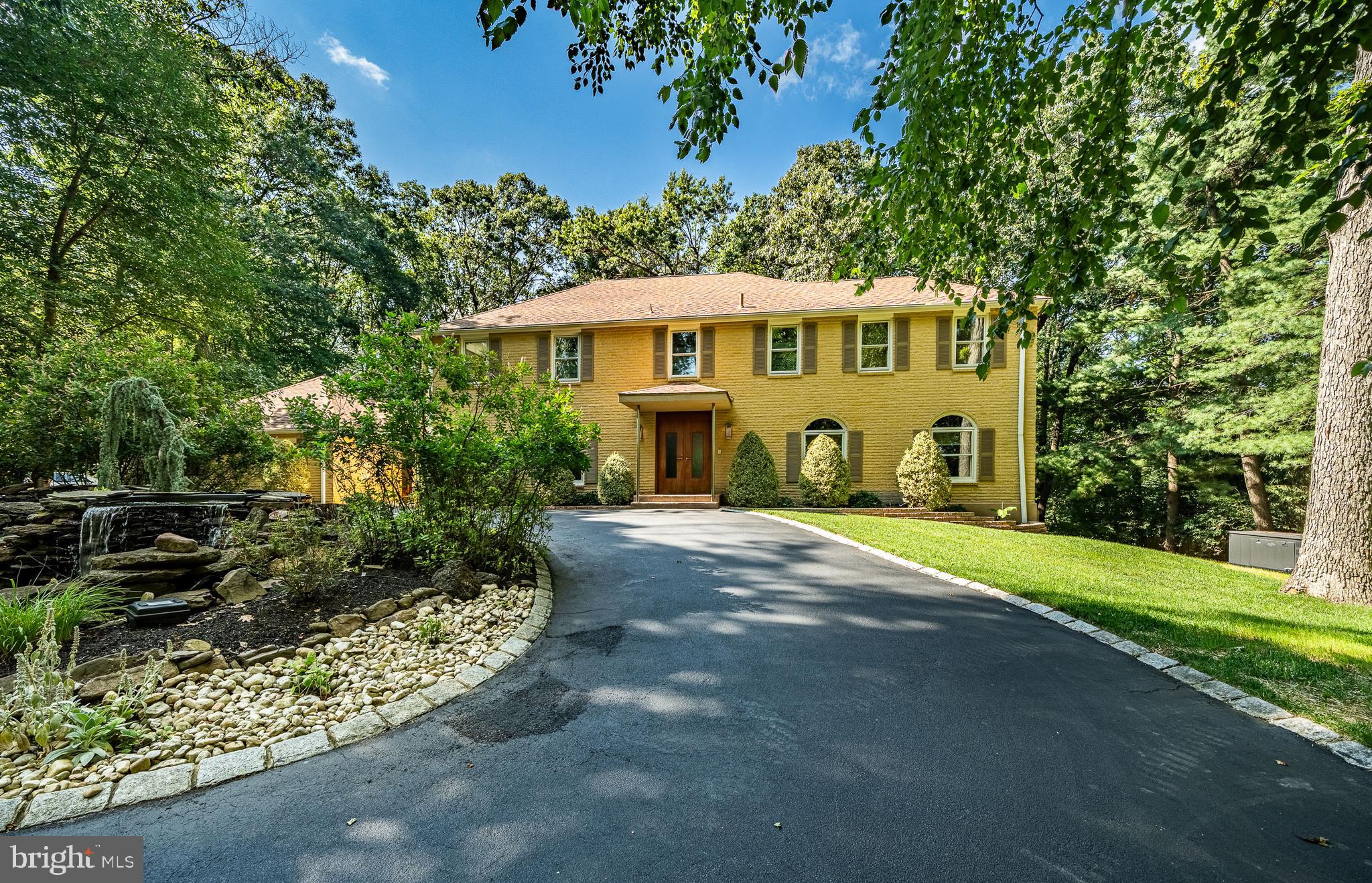 A Distinctive Country-Inspired, Rustic Designed, Luxury Retreat! This remarkable residence is where luxury, privacy, and nature unite. Nestled in a serene, wooded setting this nearly 5,000 square foot custom-built home offers a one-of-a-kind lifestyle, masterfully blending modern sophistication with natural beauty. Designed to blur the lines between indoor and outdoor living, the rear of the home is enveloped in walls of glass, offering uninterrupted panoramic views and creating the serene feeling of a modern Main Line masterpiece. Programmed exterior night and landscape lighting enhance the breathtaking setting after dark. Inside, the meticulously crafted living spaces await, featuring high-end finishes, custom millwork cabinetry, and thoughtful architectural details throughout the property. Rich materials such as granite, maple, anigre cherry and cherry wood species are highlighted alongside custom doors—some with rain glass inserts, others sliding or pocket-style. The gourmet kitchen is a true culinary showpiece, featuring Sub-Zero refrigeration, Thermador double ovens, a warming drawer, Gaggenau deep fryer, and a Kohler steamer. Dual sinks—thoughtfully designed for prep and cleanup—enhance functionality, while a custom pantry ensures effortless organization. The adjoining family room space is both inviting and refined, with dramatic skylights and a sleek fireplace that elevate the ambiance. A dedicated media room redefines in-home entertainment, featuring integrated surround sound, projection system, and a full-size screen—creating an immersive cinematic experience. Upstairs the opulent primary suite offers an unparalleled private retreat, crowned by soaring cathedral ceilings and custom cabinetry. The lavish, spa-inspired bath features heated granite floors, His and Her water closets, a grand 6-foot Jacuzzi soaking tub, and an expansive walk-in shower adorned with body sprays, handheld and rain shower heads, and an integrated steam sauna system — all thoughtfully designed with the flexibility to convert into two full bathrooms if desired. A magnificent walk-in closet, generously proportioned to accommodate a fifth bedroom conversion, enhances the suite’s versatility. Additional indulgences include a beautifully appointed vanity, a discreet laundry chute, and custom built-ins housing a mini-fridge and microwave — perfect for enjoying late-night refreshments in complete comfort and style. Additional accommodations, on this level, include three generously sized bedrooms each thoughtfully designed with peaceful views, abundant natural light and ample closet space and a second bathroom with heated marble floors and custom cabinetry. The fully finished walkout lower level provides exceptional versatility, featuring a private fifth bedroom, a full bath with jacuzzi tub, kitchenette, and an expansive flex space ideal for a home gym, studio, or additional living area — perfect for extended stays or multigenerational living. Step outside to experience resort-style living: a 40' x 24' in-ground pool surrounded by Ipe wood decking, a sleek cabana with a full bathroom for added convenience, and a fully equipped outdoor kitchen—perfect for seamless entertaining. ADDL FEATURES: 1) Full-house Generac Generator including 1,000-gallon underground propane tank with hard-line connections. 2) 400-Amp, Surge Protected, Electrical Service 3) Three-Zone Heating and Cooling System 4) Smart Home and Mechanical Upgrades Include: Lutron light control system; Central vacuum system; Advanced security system with exterior cameras; 7-zone irrigation system; and 175 recessed downlights throughout. Ideally situated just minutes from award-winning schools, world-class shopping, and major highways. 400 Highview Drive delivers a unique and wonderful blend of natural beauty, modern luxury, and extraordinary convenience. This is not just a home — it’s a one-of-a-kind lifestyle on the Main Line!