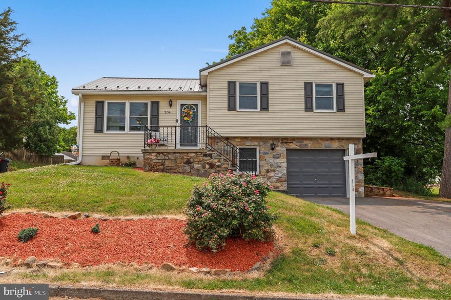 Welcome to S Hall Street! This great split level in the town of Sharpsburg offers you quaint living with many upgrades! Entering the home you have the Living Room, Dining Room and Kitchen! On the upper level are 3 bedrooms and the full bath! On the lower level is additional living space--many options for use, and access to the garage, as well as a laundry room and half bath! The home offers plenty of parking and a great backyard--on a corner lot, as well as a porch and a patio!The upgrades to the home include: a new roof (5 years), driveway (2-3 years old), new heat pump (2 yrs), new front door and storm door, new shutters, new shower (2 yrs), new gutters (1 yr) and new replaced windows (2023).