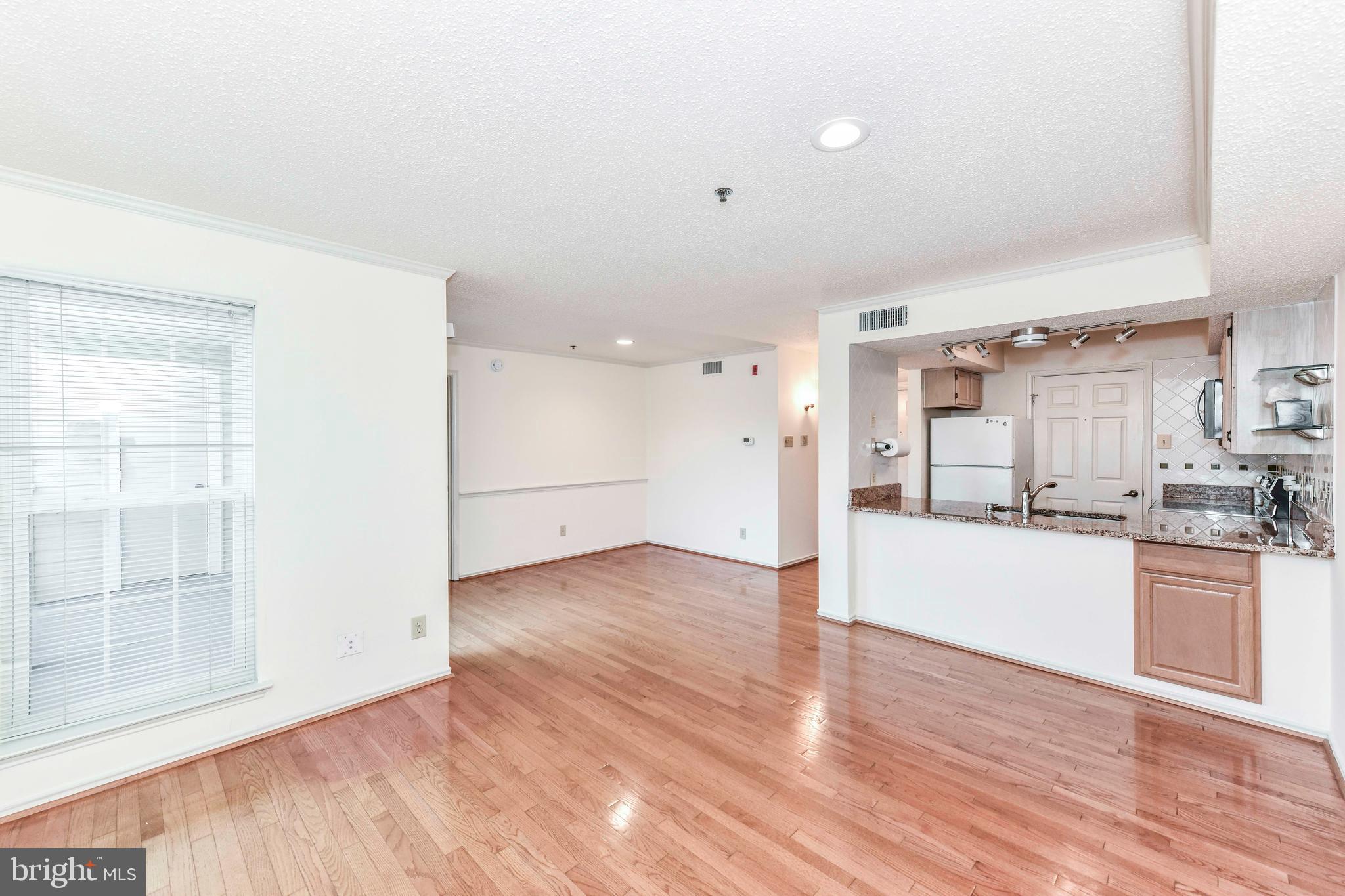 Fantastic 1BR, 1BA condo in desirable Fountains at McLean*Walking Distance to 2 Metro Stations in heart of Tysons*Main level features hardwood floors, neutral paint tones & ample sunlight throughout*Kitchen features granite counters, complimentary tiled backsplash, stainless steel appliances & ample cabinetry*Dining area off kitchen leads to spacious living room with decorative-only fireplace & sliding glass doors leading to balcony*Spacious bedroom with ceiling fan, walk in closet & full en suite bath with granite vanity & tiled floors*Community amenities include swimming pool, gym, lounge, ping pong & billiard*Excellent commuter location with easy access to 24-hour Harris Teeter, 495, 267 Dulles toll road, Route 23, 66 & 7*Also near Spring Hill & Greensboro Silver Line METRO stations*Parking is available in the upper-level parking garage, and a reserved spot is provided at Parking Spot #20*
*AVAILABLE FOR LEASE 8.8.25*