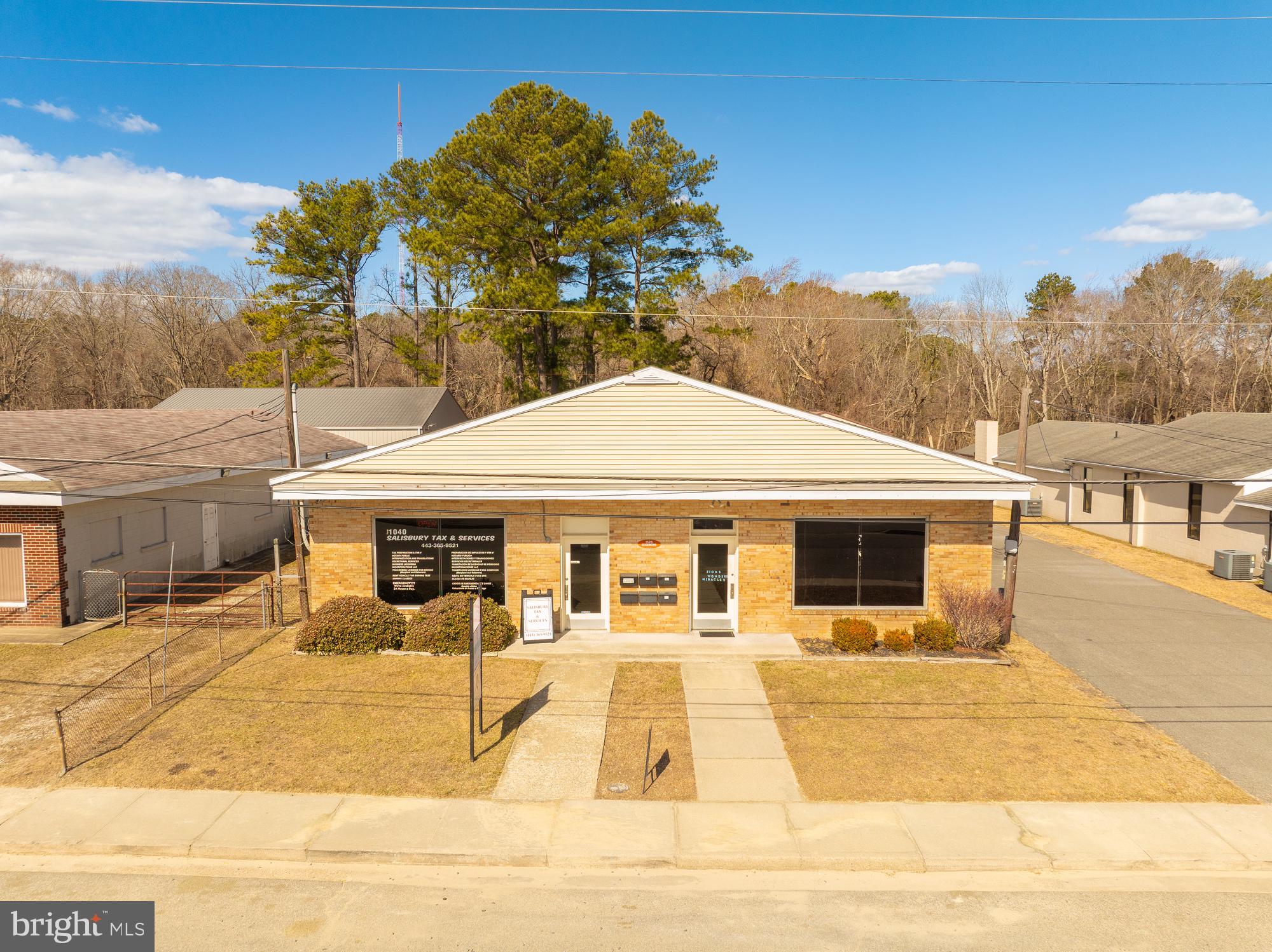 BACK ON MARKET, due to previous buyers inability to qualify for financing.
Warehouse, office and an additional pole barn on one parcel.
-Perfect for a contractor or similar use, with office warehouse combo, a small yard and pole shed.
-The pole shed is +/- 30' x 30' and unconditioned.
-Occupy the rear office/warehouse and enjoy $2,450 in income from the front tenants.
-Leases have an optional 30 day, termination upon sale provision.
-Approximately half of the building is leased, year to year, to a large church who pays their separately metered utilities & $1150/month gross. Two other small tenants pay $1300.00/month gross.
-Great location with easy access to business Rt. 13, the Rt. 13 bypass, and Rt. 50.
-Concrete block exterior with new roof, and sealed and painted exterior in 2024. New LED lights in 2023, slashing electric bills by more than half.
-See documents tab for the leases, floor plan and an outline of the unoccupied space.