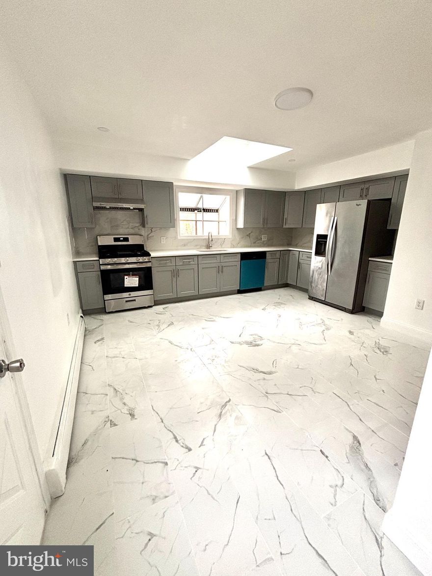 Beautifully renovated twin-style 3-bedroom, 1.5-bath home located on a quiet, well-maintained block in Tacony. Step inside to a spacious, modern living room with neutral finishes that flow into a generous dining area—perfect for entertaining. The oversized kitchen boasts stainless steel appliances and an exterior-vented exhaust system, allowing you to cook freely without lingering odors. A tucked-away laundry area with washer and dryer, along with a convenient first-floor powder room, add to the home's functionality.

The second level features three large bedrooms with ample closet space and a beautifully upgraded, fully tiled 3-piece bathroom. With a fenced-in yard and thoughtful updates throughout, this move-in-ready home offers comfort, style, and convenience.