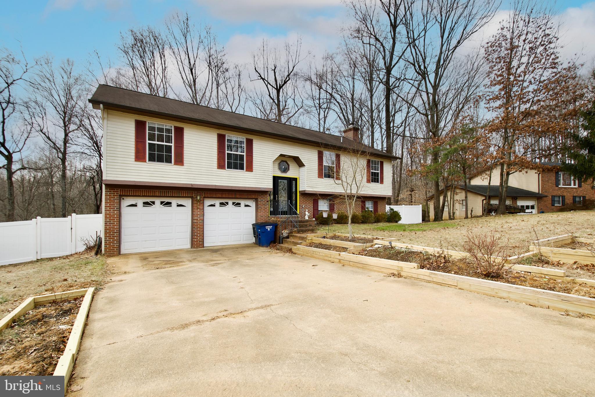 This stunning detached home features four spacious bedrooms, and updated bathrooms. The large kitchen offers plenty of cabinets for storage and upgraded countertops for easy food prep. Gleaming wood floors can be found through out the home. On the lower level you'll find a cozy family room with a wood burning fireplace and new patio doors for easy access to the fenced back yard. The laundry room is also located on this level as well as a bedroom and full bath. Enjoy outdoor living and relaxing on the large maintenance free deck, perfect for sipping a morning coffee or a gathering with friends. The modern layout of the home is perfect for entertaining with the large living room that flows seamlessly into the dining room and kitchen. Located in a quiet and friendly neighborhood perfect for walking, jogging and minutes from shopping and restaurants. Schedule a showing today and make this property your new home!