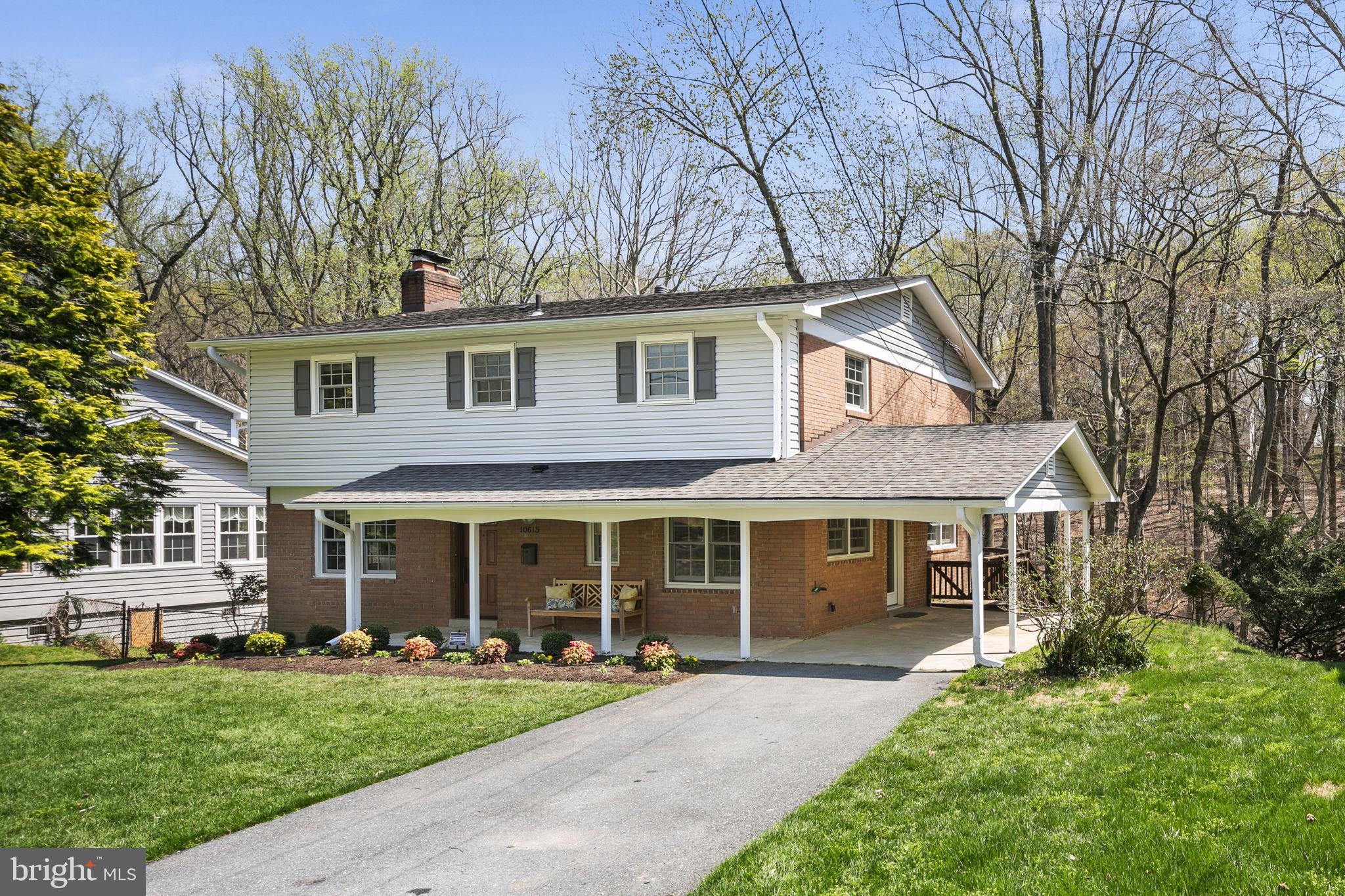 Charming single family home in Silver Spring with 4 bedrooms, 2 full & 2 half baths, and tons of great features. Welcoming covered front patio and large, freshly landscaped yards. Gleaming hardwood floors throughout, a plethora of natural light and renewal by Anderson windows in 201. Hall bath and powder room renovated in 2019 - hall bath features a jacuzzi soaking tub. New custom doors in 2016, and two gas fireplaces. Generous eat-in kitchen with plenty of cabinet space. Finished lower level is the perfect additional rec space. The massive rear deck and backyard allow for endless outdoor enjoyment, and the house backs out onto the woods, providing a beautiful view year-round. A tributary stream of the Northwest Branch of the Anacostia River runs through the property, and there is nearby access to the Northwest Branch Trail. Convenient driveway parking and covered carport are a must have. Located in a quiet and peaceful neighborhood, but with close proximity to Trader Joe's, Starbucks, and Northwest Branch Pool. Easy access to the Beltway, New Hampshire Ave, Colesville Road. Close access to shopping, restaurants, and other conveniences, as well as a straight shot to Downtown Silver Spring. Public transportation available to the Silver Spring Metro. Welcome home!