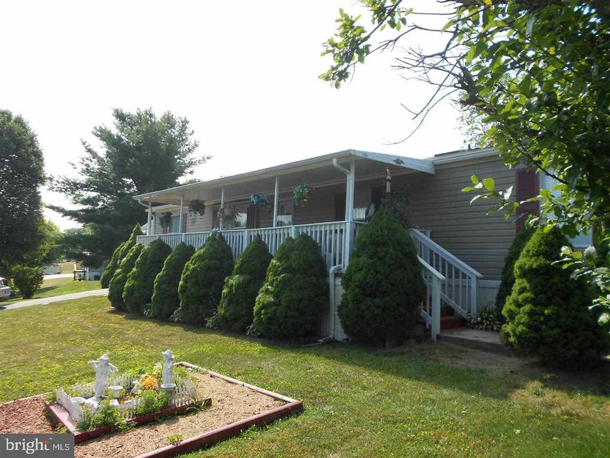 Beautiful Double Wide that has been painstakingly maintained by owner.  Some nice updates which include newer C/A and furnace (2015).  Great covered front porch and plenty of room are some of the nice features of this home.  Lovely landscaping and storage shed too.  Hurry!!!