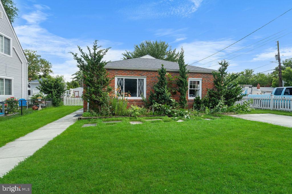 Charming 2–3 bedroom, 1 bath brick rambler just off Main Street in Historic Laurel! This updated home features brand-new Luxury Vinyl Plank flooring, fresh paint, new lighting, appliances, vanity, young Roof!. The kitchen opens to the living room with a custom live-edge bar, creating a warm open feeling. Enjoy the spacious, flat fenced-in yard with a patio hot tub and storage shed—perfect for relaxing or entertaining. The flexible third room can serve as a bedroom, office, or hobby space. Located just a short stroll from Patuxent River Park with scenic trails and picnic areas. A perfect blend of charm, updates, and convenience in a sought-after neighborhood!