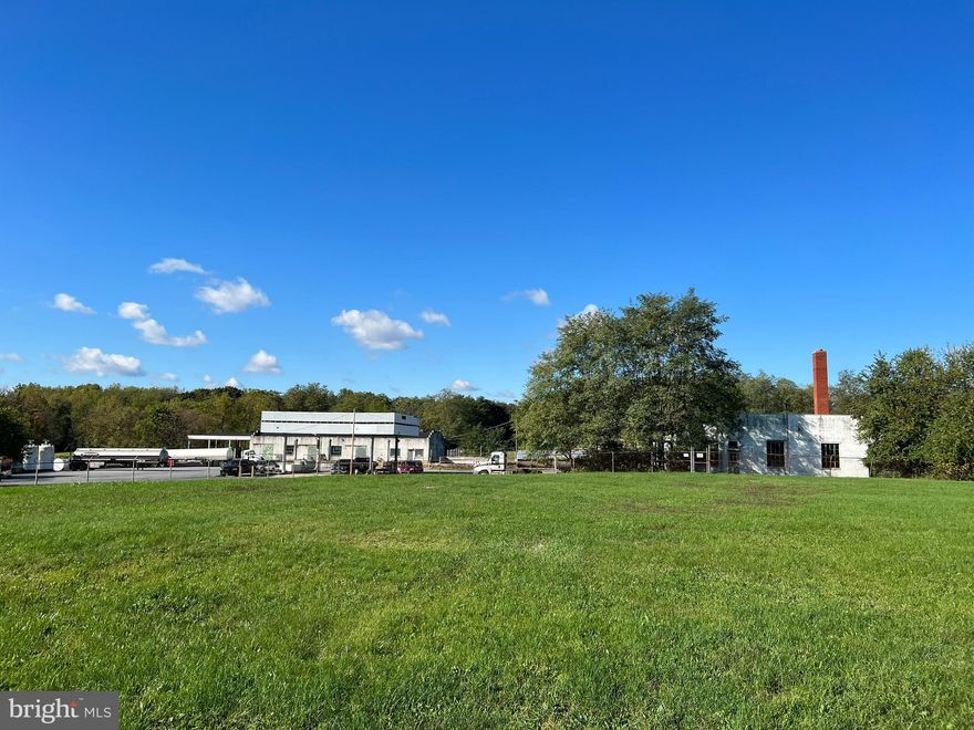 35 acres zoned industrial with 2 existing block buildings built in the 70's.  This  property was formally a petroleum  bulk storage facility and the tank farm was dismantled in 2001. Public water and sewer are available and located on Sinclair Rd.  Parking area and building are leased until 12/2024
Part of site is in PA's Act 2 Program .