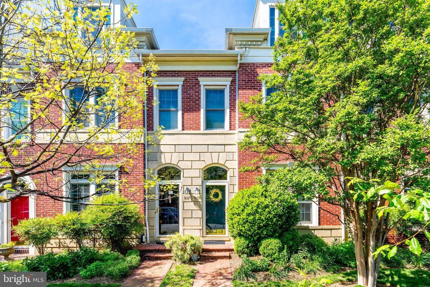 Welcome to 905 Bernard Street, a beautifully maintained traditional brick townhome nestled on a quiet street in Northern Old Town Alexandria. This wonderful 3 bedroom, 3.5 bathroom home offers modern updates including high ceilings, crown molding, recessed lighting, plantation shutters, and hardwood flooring throughout.
Upon entry, you're greeted by a spacious open-concept living and dining area, perfect for both everyday living and entertaining. The home continues into the kitchen open to the family room with custom built-in shelving and a cozy gas fireplace with a handsome wood mantle. The kitchen features granite countertops, tile backsplash, stainless steel appliances and abundant wood cabinetry. The family room opens to a private patio that leads to the detached garage with attic storage. A powder room and coat closet complete the main level.
A custom stair runner leads you upstairs to the second level, where the luxurious primary suite features vaulted ceilings, two walk-in closets, and a spa-like en-suite bathroom with a soaking tub, large glass-enclosed shower, double vanity, and private water closet. The second bedroom includes a spacious walk-in closet and access to a full hallway bathroom. A dedicated laundry area is also conveniently located on this level.
The third floor offers a versatile home office with built-in desk and shelving, a third bedroom, an additional full bathroom, and valuable extra storage space.
Located just one block from beloved local spots like Rustico Restaurant, Buzz Bakery, and Slaters Market. This home also offers unparalleled convenience to the GW Parkway, Washington, D.C., and Reagan National Airport. 
Recent updates include: NEW roof on house in 2020, new roof on garage in 2021, new fence in 2024, new water heater in 2023, new dishwasher in 2024. Previous owners replaced the windows in approximately 2018, as well as one of the HVACS.