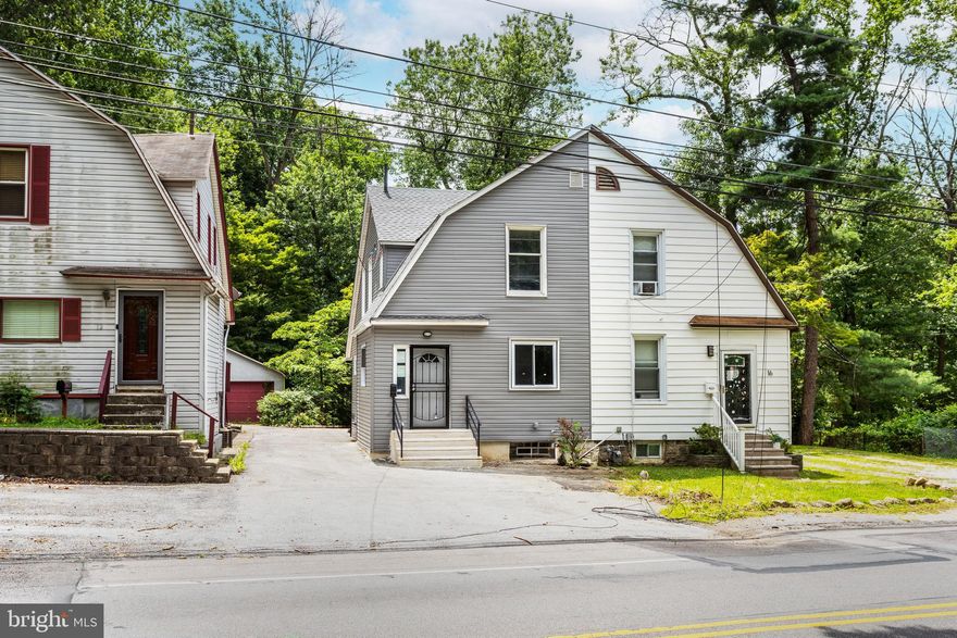Welcome to 14 W Providence Road.   If you love green and nature  this house is for you as nature surrounds  this property.  Next to Darby Creek , Penn Pines Park. This house  has gone through gut out renovation.  New  electric, new roof, new plumbing, windows, new siding,  central air-conditioning and hardwood floors.  This house offers 3 bedrooms, one bathroom, open kitchen and a rear deck for enjoying the nature.  Driveway allows parking for a few cars.  Walking distance from Lansdowne historical district, Lansdowne  train station and Mercy Hospital.