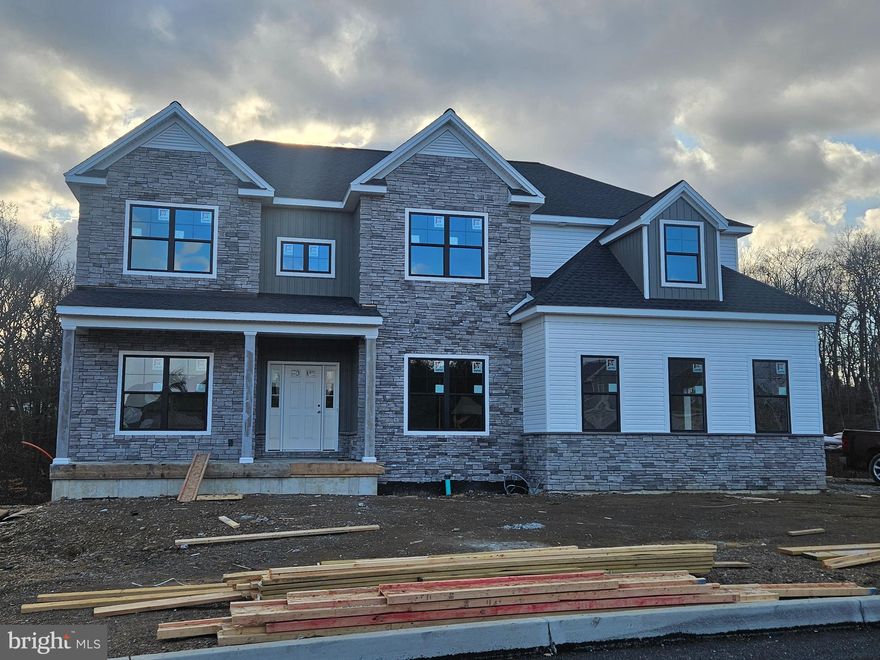 Semi-custom Parliament B floorplan being built by McNaughton Homes featuring nearly 4700 sq. ft. of finished space including a partially finished walkout lower level.  Five bedrooms, 3 full baths and two half baths with a 2 story foyer and 2 story greatroom with floor to ceiling stone gas fireplace open to an amazing gourmet kitchen.  Oversized kitchen island, double layer wall cabinets extending to the ceiling with upgraded appliances fit for a chef!  Off of the kitchen is a beautiful sunroom leading to a huge covered composite deck with stairs to grade complete this show stopping home.  Side entry oversized 2 car garage on over a 1/2 acre homesite backing to trees.  Additional homesites for sale with many floorplans to choose from in our final phase 2C within Wilshire Estates.  Inquire today to discuss plans for your NextHome!