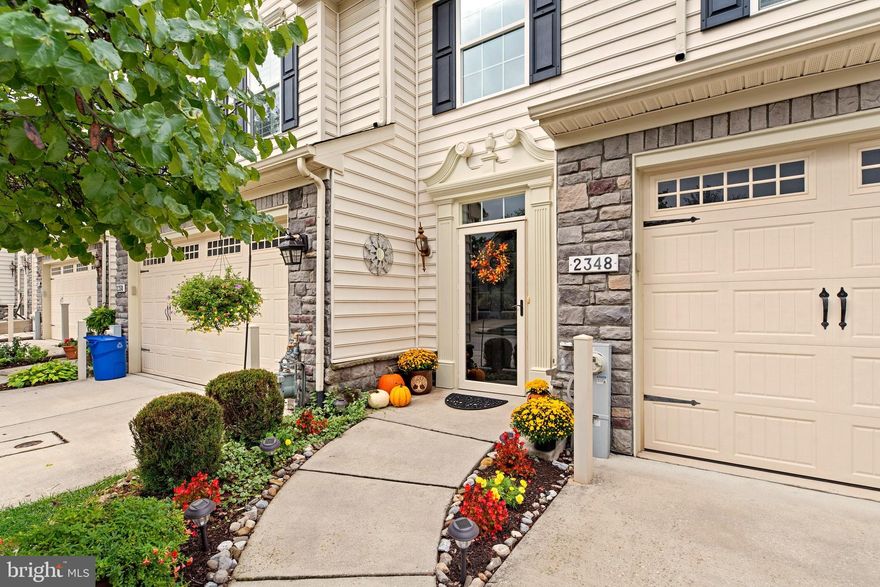 Welcome to your new home in the highly sought-after Waverly Woods West 55+ community! This pristine and  impeccably maintained 3-bedroom, 2.5-bathroom townhome is a haven of comfort and elegance, offering a perfect blend of modern convenience and natural beauty.

As you step inside, you'll be greeted by an abundance of natural light that infuses the space, creating an inviting and warm atmosphere. The first-floor primary bedroom is a retreat in itself, featuring a spacious closet and a double sink vanity ensuite bathroom for your convenience.

The family room/sunroom  is a delightful space where transom windows grace and elevate the numerous existing windows and a cozy fireplace adds a touch of charm and sophistication. A French door leads to a large deck that offers a picturesque view of nature, and the deck includes stairs for easy access to the backyard.

The kitchen is a chef's dream, boasting beautiful cream cabinets, exquisite countertops, and a meticulously detailed tile backsplash. Stainless steel appliances and hardwood floors complete the ensemble, while ample storage ensures functionality. The dining area with its vaulted ceiling is open to the second floor, creating grandeur and airiness.

Upstairs, you'll find a seating area that overlooks the dining area, adding a sense of connection throughout the home. Two additional bedrooms and a full bath offer versatility for guests or additional living space. An unfinished storage area provides ample room for your belongings.

The large unfinished basement and 2-car garage provide even more space and convenience, making this home as practical as it is beautiful. 

This home not only offers modern comfort but also the serenity of a nature-inspired setting. It's an oasis of tranquility in a vibrant community. Perfectly situated just moments away from top-notch dining and shopping options, this move-in ready gem comes complete with fantastic amenities, including a clubhouse and outdoor pool, making it the ultimate choice for those seeking an active 55+ adult community Don't miss your chance to make it your own. Schedule a viewing today and experience the perfect blend of luxury and convenience that awaits you here.