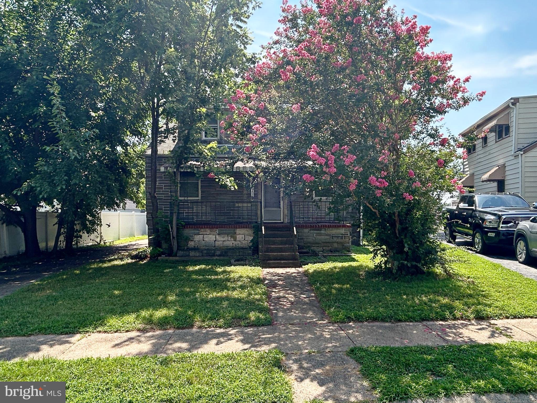 This charming Colonial-style residence, built in 1943, presents a compelling investment opportunity within the desirable Gray Manor subdivision. The property features a well-structured detached design, constructed with a combination of frame, cement siding, concrete, and brick, ensuring durability and low maintenance. Interior highlights include two spacious bedrooms and a full bathroom equipped with a tub shower. The eat-in kitchen, complemented by table space, offers potential for customization and enhancement. The unfinished basement with interior access and walkout level provides additional space for expansion or storage, presenting opportunities for future development. The exterior features a porch, which is great for relaxation, alongside with sidewalks enhancing curb appeal. The 0.19-acre lot features both front and rear yards, offering ample outdoor space for potential landscaping or recreational use. A detached garage and off-street parking add convenience and value. Investors will appreciate the potential for rental income in this sought-after area, coupled with the opportunity to increase property value through strategic renovations. The combination of location, structural integrity, and available amenities positions this property as a sound investment for those looking to capitalize on the residential market.