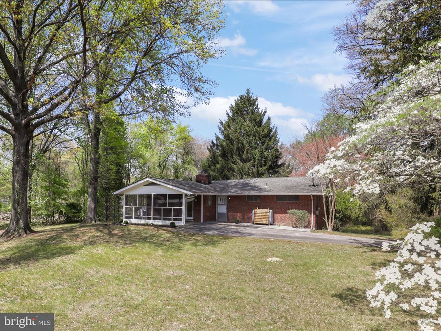 A beautiful Rambler with full basement is sited on   .82 acre,  level and clear lot.  There is NO HOA. 
This beautiful, well maintained home offers 4 Bedrooms, 2 Full bath, Large Living Room , Separate dining room, an updated decent size kitchen, 2 wood burning fireplaces,  a large family room and a den. A large utility room has washer and dryer, Well Water holding tank, water heater and plenty of space for a work bench and storage.  Hot water heater was replaced 2024. Main level has fresh paint in many areas and gorgeous wood floors. Lower level has beautiful wood panels on the walls,  A carport in-front of the house has convenient access door to the Kitchen,  In the back of the house, there is a patio ,  a Hot Tub and an over sized garage currently used as work-shop.  
Great location - conveniently located  just off Route 1 and Opitz BLVD,  Sentara Hospital and  almost immediate access to  I-95 including  EXPRESS  LANES.