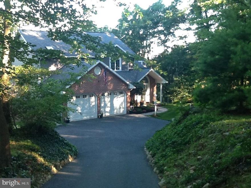 PLEASE CONTACT LISTING AGENT DIRECTLY TO SCHEDULE SHOWING-Thanks
Magnificant Views! Tranquility in this mountain top retreat! Manicured landscaping surrounds this exceptionally maintained contemporary home nestled on 1.14 acres (Lots A-64, A-66 and BUILDABLE LOT C2 convey) in peaceful Greene Knolls!  The two-story foyer opens to full living area with propane fireplace and 9’ vaulted ceilings.  3 bedrooms, 2.5 bathrooms – featuring 2,300+ sq. ft of finished living space plus a 12’x52’ walkout basement.  That’s 3,300 sq. ft. of finished living space.  The many custom kitchen cabinets provide lots of storage and the breakfast area provides a peaceful retreat space.  Main floor laundry adjacent to the kitchen.  Shiny, well maintained real hardwood floors complete the main level. Large Master Bedroom with vaulted ceiling and master bath suite with whirlpool tub and walk-in closet.  Plus an additional large bedroom (could be another master).  Large workshop/pantry off the garage.  Huge 12’x52’ deck, with lighted pergola and beautiful valley views to enjoy the peacefulness of nature, wildlife and panoramic mountain views and gorgeous sunsets. Walkout basement w/French doors.  Plus oversized 2-car garage.  Storage space is abundant with a shelved storage space off the walkout basement, floored storage space above the garage and another large, floored space over the living area.  Two zone heating/cooling.  Convenient to Gettysburg and Chambersburg.  Experience the peacefulness and tranquility of mountain living.