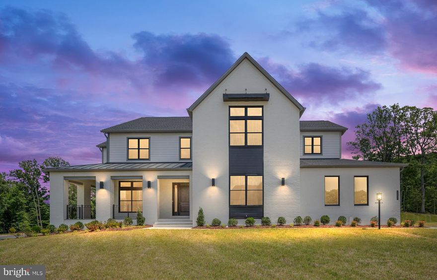 This is your final opportunity to own a dream home in one of Great Falls most exclusive communities, located within the highly sought-after school pyramid, ensuring top-tier education for your family.
Upon arrival, the grand two-story foyer with a striking glass railing staircase sets the tone for sophistication. A private yet inviting study, with French doors and elongated windows, offers a serene and light-filled workspace, a culinary excellence awaits in the chef's dream kitchen, which features top-tier appliances, engineered stone countertops, additionally, the home includes a separate prep kitchen, offering extra space for gourmet and a spacious walk-in pantry, while the great room's expansive 15-foot multi-panel stacking doors open to a luxurious outdoor living space.
This outdoor oasis is perfect for year-round enjoyment, featuring a lanai gas fireplace, ceiling-mounted heaters, and a retractable screen. The primary suite is a true retreat, with a spa-like bathroom, dual walk-in closets, and a private deck for morning coffee.
For entertaining, the recreation room includes a private guest suite, bathroom, and wet bar rough-in for future customization. Designer upgrades, including Kohler fixtures, Wolf and Sub-Zero appliances, and Andersen windows, add a touch of luxury throughout.
Don't miss your last chance to own this quick move-in home, ideally located near entertainment at Wolf Trap and upscale shopping at Tyson’s Galleria.