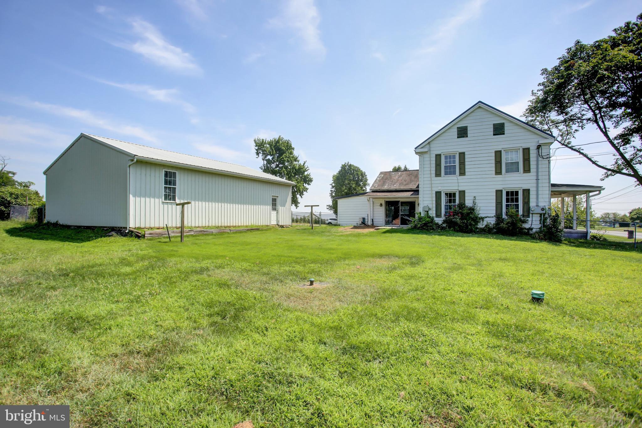 This single-family home offers approximately 1,468 square feet of living space. The residence features three bedrooms and one bathroom. The fenced yard provides a secure and private outdoor area.
The 30X40 building with headroom for a lift offers many possibilities for the weekend mechanic or to have your own business. There is no zoning or restrictions that the seller is aware of. The seller is motivated. Bring an offer.