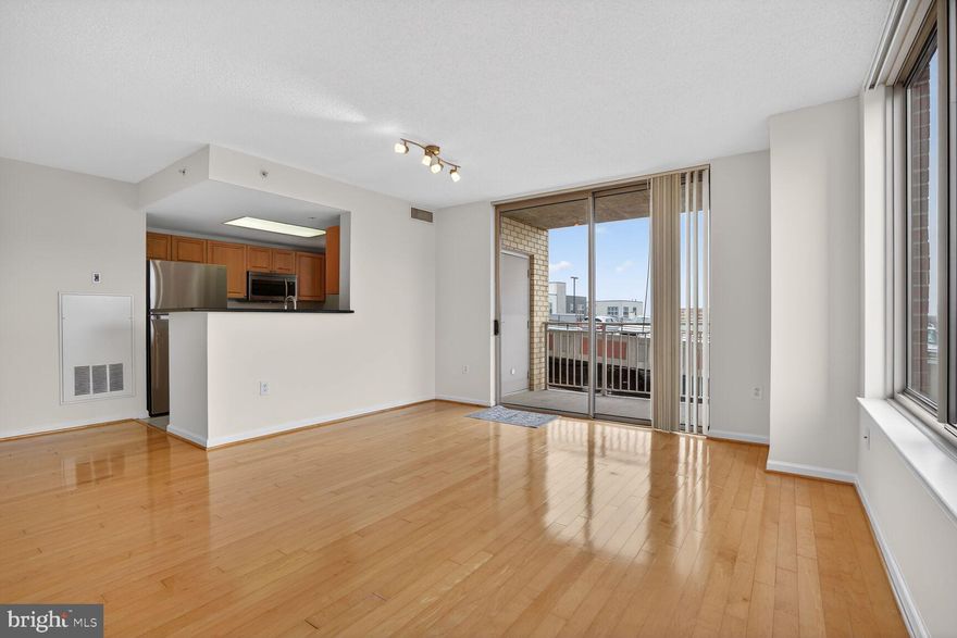 Wilton House is one of the gorgeous high-end buildings located directly across the street from the Dunn Loring Metro Station.
This corner unit features abundant natural light, 2 bedrooms, and 2 fully updated bathrooms. Enjoy walk-in closets, a private balcony, wide-open living areas, a welcoming foyer, and extra closet space. Granite countertops and stainless steel appliances. The unit also includes 2 garage parking spaces and the always convenient in-unit washer and dryer..  2026: New carpet and fresh paint. 2020: New water heater.  Built in 2005.
Ideally located near I-66, I-495, and Route 50, with equidistant access to Reagan National and Dulles International Airports. Just minutes from Tysons Corner I and II, featuring retail stores, an Theater  and numerous restaurants.
Building’s amenities include an outdoor terrace, cozy rooftop pool, fitness center, 24-hour front desk concierge, on-site management, package delivery room, office space, party room, community center, and game/billiard room.
Discover the perfect blend of urban-style excitement near the Mosaic and Merrifield Districts, Offering convenient access to restaurants, shopping, and transportation to the city. Groceries (Harris Teeter) and Metro Station literally located across the street.  This is a Must See Unit!.