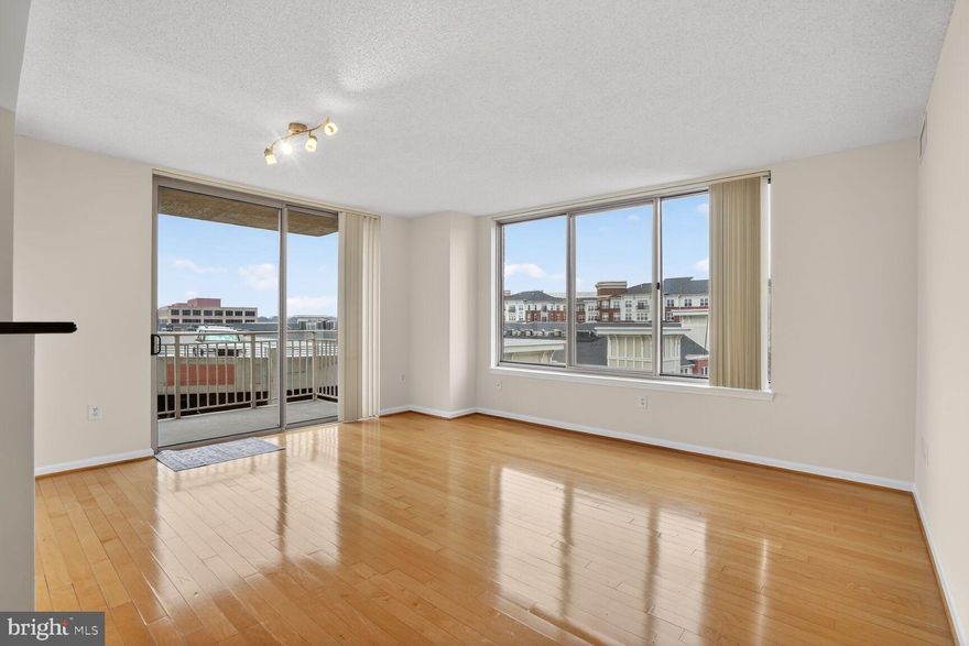 Undeniably a great Price for:   A corner 2 bed-2bath unit with 2 car garages, with in-unit washer and dryer, across the street from Dunn Loring Metro Station and Harris Teeter.  With a private Balcony, With a brand new carpet and just painted.  In one of the most sough-after buildings around Mosaic and Merrifield areas!  All the top conveniences everyone wishes to have.

Abundant natural light. Oversized windows, walk-in closets, wide-open light-filled  living areas, a welcoming foyer with  extra closet space. 
Granite countertops and stainless steel appliances. The unit also includes 2 wide size garages on level P2 just across the elevator, HOA provides additional storage room.. 2020: New water heater.  
Quick access to  I-66, I-495, and Route 50, with equidistant access to Reagan National and Dulles International Airports. Just minutes from Tysons Corner I and II, featuring retail stores, a Theater  and numerous restaurants.
Wilton House Building’s amenities include  a rooftop pool and terrace, fitness center, 24-hour concierge, on-site management, package room, business center, party room, and lounge. 
Discover the perfect blend of urban-style convenience in one of the most desirable and sought-after communities just off Gallows Road—a place where modern living meets exceptional appeal. This is a Must See Unit!.