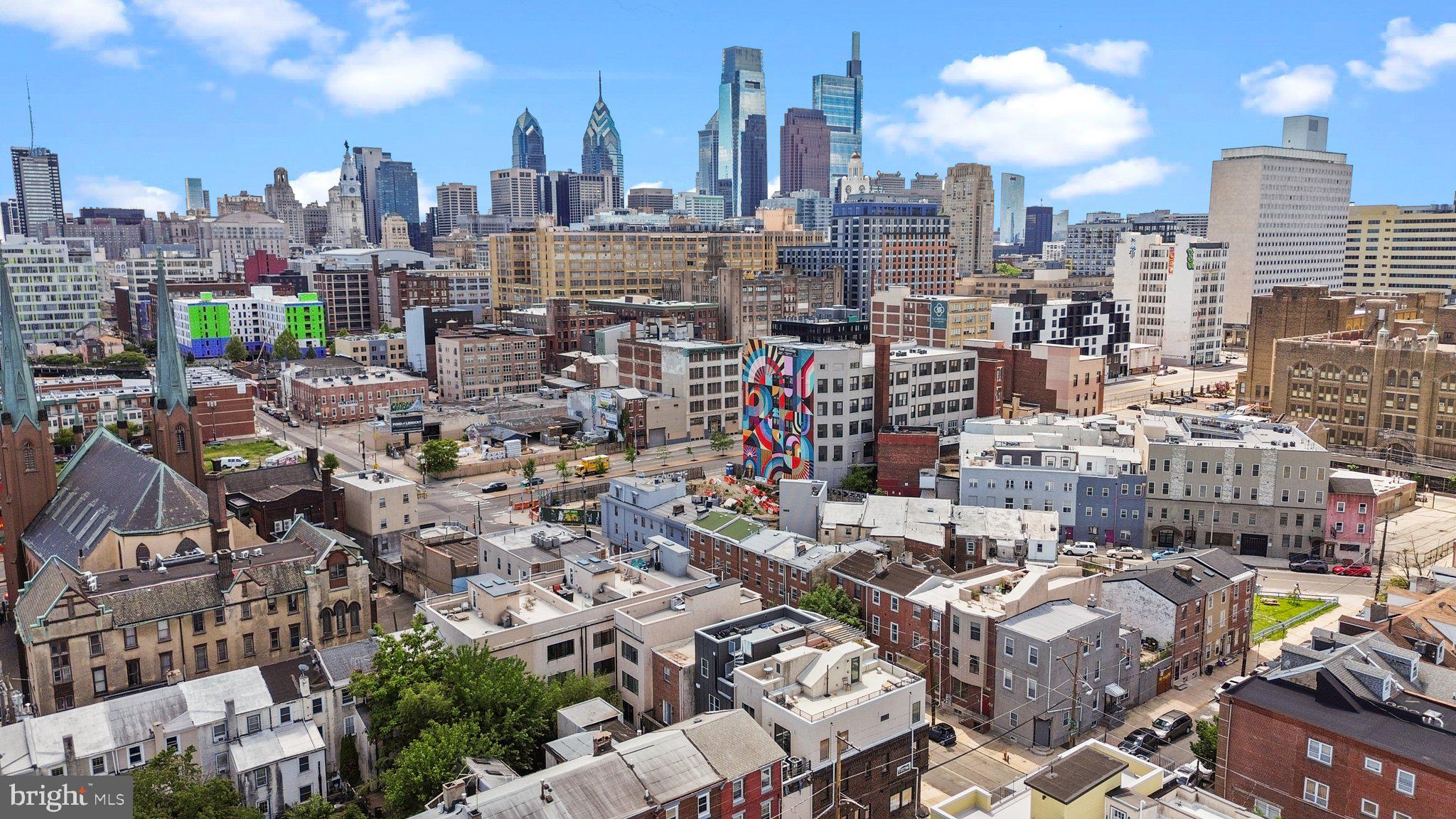 Stylish Living with a Private Rooftop in Spring Garden! Welcome to this spacious and thoughtfully designed condo, offering three stories of comfortable living in Philadelphia’s vibrant and historic Spring Garden neighborhood. One of the home’s most impressive features is the expansive private rooftop deck—offering over 570 square feet of outdoor space with sweeping skyline views. Whether you’re hosting friends or unwinding after a long day, this rooftop delivers a lifestyle that’s hard to match. For added convenience, there’s even a built-in sink; perfect for outdoor cooking, cleaning up, or keeping the party going. Inside, you’ll find modern finishes and wood floors throughout, creating a clean and contemporary feel. The kitchen is equipped with stainless steel appliances and opens to a dedicated dining area and a spacious living room—ideal for entertaining or just kicking back. A convenient half bath on the main level is great for guests, in addition to two full bathrooms upstairs. Both bedrooms come with ample closet space & high ceilings offering comfort and privacy for everyone. You’ll also enjoy the benefit of an included tax abatement, helping keep monthly costs down. Just steps from local favorites like Café Lift, Love City Brewing, La Chinesca, and the Rail Park, and within walking distance to Reading Terminal and Broad Street, this home keeps you close to all the best parts of the city—without the traffic and noise of Center City. Quick access to I-95 makes commuting a breeze. If you’re looking for a move-in-ready home with great vibes, a killer rooftop, and a location that hits the sweet spot, this one is definitely worth a look.