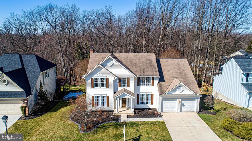 THERE IS MUCH TO LOVE ABOUT THIS ATTRACTIVE, WELL CARED FOR COLONIAL IN SATYR HILL ESTATES. 4 BEDROOMS/3.5 BATHS. APPEALING NEUTRAL DECOR THROUGHOUT.  KITCHEN OFFERS GRANITE COUNTERTOPS, GAS RANGE, SUBWAY TILE BACKSPLASH, EAT-IN TABLE SPACE, PANTRY, AND SLIDER TO DECK. FAMILY ROOM OPEN TO THE KITCHEN IS COMFORTABLE WITH A WOOD BURNING FIREPLACE, MANTLE, & BRICK HEARTH. FUNCTIONAL MUDROOM LEADS TO AN OVERSIZED LAUNDRY ROOM W/UTILITY SINK & WASHER/DRYER. PRIMARY BEDROOM HAS WALK-IN CLOSET AND EN SUITE W/VANITY WITH DUAL SINKS, SOAKING TUB, SEPARATE SHOWER. 3 ADDITIONAL GOOD SIZED BEDROOMS. LOWER LEVEL IS COMPLETE WITH A RECREATION ROOM, BUILT-IN CABINETRY W/WET BAR, FULL BATH, BONUS ROOM, STORAGE ROOM, WALK-OUT TO PAVER PATIO. REAR YARD IS PEACEFUL BACKING TO TREES. HEAT PUMP 2021 . GUTTERS 2023 . WATER HEATER 2020. GARAGE DOORS 2019. DISPOSAL 2019. PERFECTLY LOCATED TO MAJOR THOROUGHFARES, SHOPPING, RESTAURANTS, SCHOOLS.