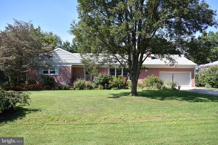 Amazing Brick Rancher in Central Schools ! Lovingly maintained and full of upgrades. 3  Bedrooms with 2.5 baths. Hardwood floors and 2 fireplaces. Walk up attic space with extra storage. Fully finished lower level with family room and half bath. 20X15 screened porch overlooking huge, picturesque level yard with Yorktown above ground pool. Covered Patio. Basement has waterproofing system with lifetime, transferable warranty. Lower level has optional 4th bedroom and workout area. 2 car garage with additional space for work bench and additional storage.