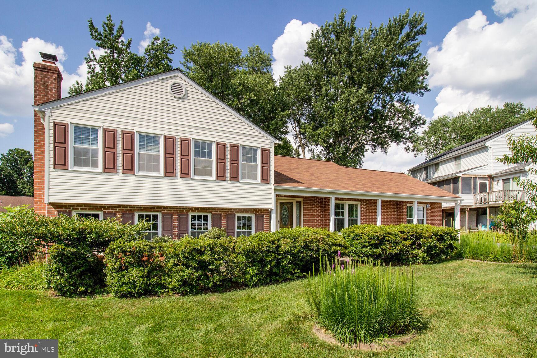 Welcome to this charming 4-bedroom, 2.5-bath single family home nestled in the heart of Glenmont - a rare Columbia outparcel community with no CPRA or HOA dues! Enjoy all the perks of Columbia living without the fees, just minutes from Centennial Park, Columbia Town Center, top-rated restaurants, Whole Foods, and the award-winning Howard High School. This beautifully maintained home sits on an idyllic culdesac with wide, tree-lined streets, sidewalks, and walking paths perfect for bike rides, block parties, and carefree adventures. The main level offers a light-filled open layout with formal living and dining rooms boasting new carpet (2025), an upgraded kitchen featuring granite countertops, custom wood cabinetry, a large pantry, and a sunny breakfast area overlooking the front garden. A bonus main level rec room with new carpet (2025) provides flexible space for an office, potential 5th bedroom, kids’ playroom, or home theater. Retreat to the upper level owner’s suite with dual closets - including a walk-in - plus a vanity station and a renovated en-suite bath with walk-in shower. Two additional bedrooms share an upgraded full bath with a tiled shower/tub combo and updated finishes. The lower-level family room is perfect for movie nights in or entertaining, complete with built-in bookcases and a cozy wood-burning stove. A spacious 4th bedroom offers ideal privacy for guests, in-laws, or a second office, with easy access to the powder room. Enjoy everyday conveniences like a large laundry room with full-size washer and dryer, extra freezer, outdoor shed for yard tools, and plenty of storage space including under-stair closet, and attic with pull-down stairs. Prepare to be whisked into a fairytale, delighting in the butterflies and goldfinches that gather in the garden among the gorgeous pink azaleas, almond and apricot trees, and pomegranate bush while relishing the fruit from the mature fig trees, enchanting grapevine from the English Royal Garden, and the Early Elberta peach tree. Savor the fruit harvest from your private orchard on the sunny two-tier patio while hosting a memorable summer BBQ or watching kids and pets play in the peaceful rear yard with space for future playset or pool. With a long driveway that fits 5+ cars and ample street parking, this home combines comfort, character, and convenience in one of Columbia’s most beloved neighborhoods. Don’t miss your chance to write the next chapter in this Glenmont gem!