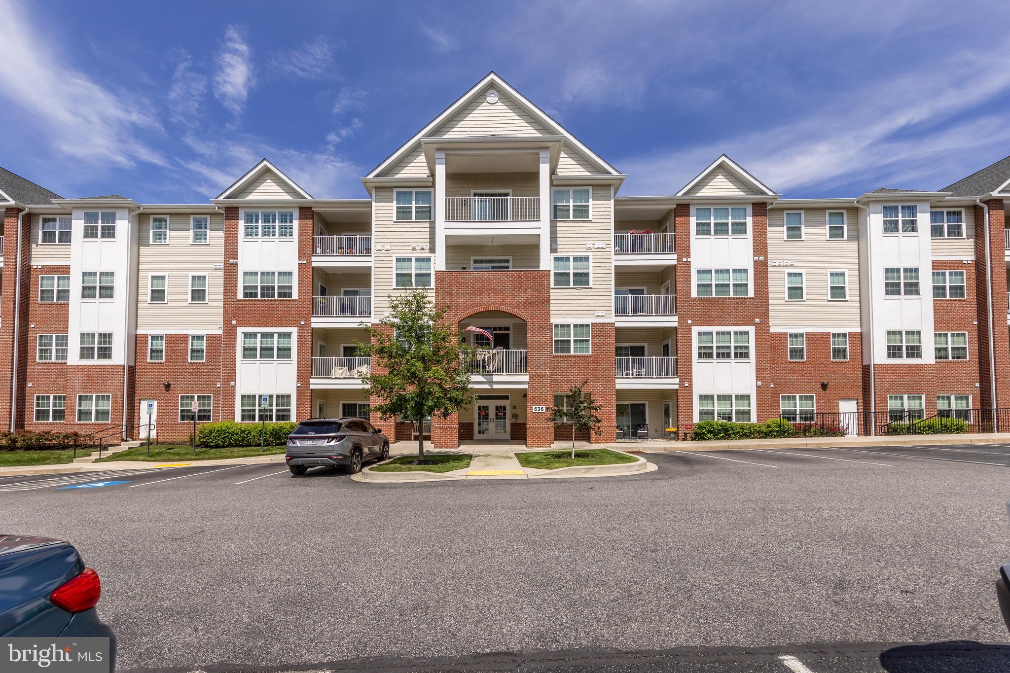 Welcome to The Overlook at Gateway — A Rare Gem in a 55+ Community! Get ready to fall in love with this rarely available, spacious 2-bedroom, 2.5-bathroom condo offering nearly 1,700 square feet of comfortable and stylish living space. Located in the highly sought-after Overlook at Gateway, a quiet and beautifully maintained 55+ community, this home truly has it all — from beautiful interiors to amazing amenities. Step inside and you’ll immediately notice the 9-foot ceilings and wide plank flooring that give the space a bright and open feel. The living and dining areas are large and perfect for entertaining friends or simply relaxing at home. Just off the main living area, you’ll find a private patio with peaceful, scenic views of the Ma and Pa Trail — a perfect place for morning coffee, quiet reading, or enjoying nature right from your home. The modern kitchen is a cook’s dream. It features sleek stainless steel appliances, plenty of cabinet space, and stylish countertops. Whether you’re cooking a big holiday meal or a quick breakfast, this kitchen will make it easy and enjoyable. Both bedrooms are spacious and designed for comfort. The primary suite includes a large walk-in closet and an ensuite bathroom with dual sinks, a walk-in shower, and a relaxing shower seat for ease of use. The second bedroom is also generously sized— ideal for guests, hobbies, or a home office. There's also a convenient half bathroom near the living space for visitors. You’ll love the walk-in closets throughout the condo, giving you lots of room for storage and organization. Everything in this unit has been well cared for and thoughtfully designed to make everyday living feel easy. Living at Overlook at Gateway means more than just having a beautiful home. The building includes reserved, in-building parking, so you’ll never have to worry about finding a spot or dealing with bad weather. You’ll also have access to the community room and fitness center, where you can meet neighbors, stay active, and enjoy planned activities or quiet time. This home is also conveniently located near shopping, restaurants, medical offices, and more — giving you easy access to everything you need while still enjoying a peaceful, private setting. If you’ve been looking for a low-maintenance, beautifully designed home in a friendly and active 55+ community, this is the one you’ve been waiting for. With nearly 1,700 square feet of space, modern features, and stunning views, this rare find won’t last long. Schedule your showing today and come see everything this special condo has to offer!