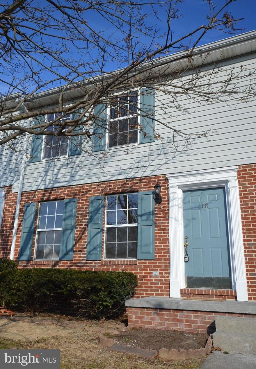 2 Bedroom, 1.5 bath townhome with renovated kitchen, original hardwood floors, and fenced backyard.  Great location, and Won't last long! No pets and No Smoking.