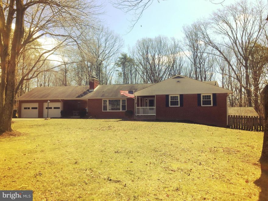 Gorgeous 4 BR,3 BA rambler on a beautiful 5.57 acre lot in scenic Clifton!The natural setting in backyard offers gorgeous wooded views w/ rolling hills and low landscaping maintenance. Main lvl boasts gleaming HW floors, wood burning FP, 3 of 4 bedrooms, and an updated master and guest bathroom.Deck has been recently installed as well as brand new windows!  1 acre cleared &  5 acres wooded.