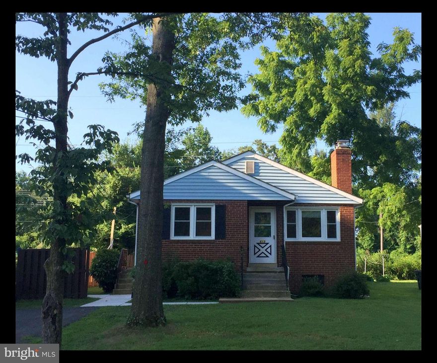 Situated in the heart of Falls Church City, walk to shopping and restaurants, < 1.5 miles to WFC metro! Spacious front and back yard, backs to W&OD bike trail.  Tons of storage space on lower level, 2nd full bath, office, rec room, laundry. Lawn mowing/gutter cleaning included in rent.  Fireplace ornamental only. No more than 2 incomes to qualify, min income $114,000, no smoking, no pets.