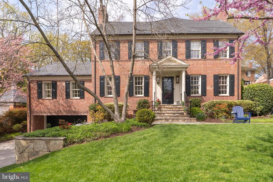 Under Contract! Presenting this stately seven-bedroom, seven-and-a-half-bath Colonial Revival home, nestled on a lush 9,411-square-foot lot in the heart of Kent. Originally built in 1936, the home was masterfully expanded and reimagined by renowned architect Dale Overmyer to offer over 7,000 square feet of space across four levels.
The classic Colonial-Revival architecture and lush landscaping sets an elegant tone, while inside, rich hardwood floors and detailed crown moldings speak to the home’s timeless character. The entry foyer is flanked by formal living and dining rooms, the latter sharing a double-sided fireplace with the spacious family room. The gourmet kitchen is a chef’s dream - featuring a large center island, gas range with venting hood, wine bar, breakfast nook, and an adjoining sitting area that opens to the flagstone terrace. Oversized windows and French doors throughout the main level create exceptional indoor-outdoor flow and bathe the interiors in natural light. A powder room, walk-in pantry, and generous mudroom with built-ins and laundry complete this level.
Upstairs, the expansive primary suite offers a sitting room, private balcony with leafy views, a custom-built dressing room with a second set of laundry, and a spa-inspired bath. Two additional bedrooms and two bathrooms (one ensuite), plus attic storage, complete the second floor. The top level features two more bedrooms—one with a large sitting area and ensuite bath—and an additional hall bath.
The walk-out lower level provides remarkable flexibility with high ceilings and an expansive footprint. A large recreation room, game room, gym, office, sixth bedroom with full bath, and a two-car garage  and abundant storage round out the space. 
Outdoors, the grounds are professionally landscaped and framed by mature trees, offering unparalleled privacy and serenity. Enjoy multiple seating areas, a covered terrace with fireplace, and ample space for entertaining or relaxation.
This home is a rare opportunity to own a beautifully preserved and extensively updated architectural gem in one of Washington’s most sought-after neighborhoods.