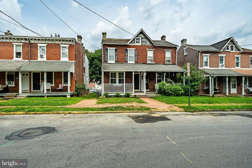 Only 1 full time college student can reside here per borough rules. West Chester borough Brick twin. Renovated in 2019. 3/4 Br 2 Baths Front open porch w/ 2 Adirondack chairs, Entry, LR (11 x 14.7), dining -room (11.2 x 11.8), modern kitchen (11.1 x 9.2) w/ Island featuring electric outlet, room for 2 stools, granite counters, LG steel appliances including d/w, micro-wave, gas range, double door refrigerator with bottom freezer, recessed lighting, o/e to rear deck ( 15.9 x 12.1) great for bar-b-ques, or just relaxation. Huge length wise rear yard, leading to off street parking for at least 4 vehicles. Finished lower level (18.5 x 10.6): new carpet in basement and stairs, open beamed ceiling w/ recessed lights. Potential rec-rm or 4th bedroom, full bathroom, with side-by-side laundry facilities. 
2nd fl. Main br front (13.5 x 11) good closet space and access to the attic. Middle br (11.1 x 9), 3rd br closest to bathroom (10.8 x 8.3) Freshly painted. Gorgeous hardwood floors throughout. Ceramic tile in the bathrooms. Plenty of recessed lighting t/o. charming paver sidewalk and walkway to the front door. Traditional floor plan. The black woodwork offers a unique/modern look. This home boasts contemporary amenities that provide convenience and luxury, including updated bathrooms, a gourmet kitchen with state-of-the-art appliances, and a traditional layout that encourages seamless indoor-outdoor living. Huge mostly fenced in rear yard and parking for at least 4 vehicles.