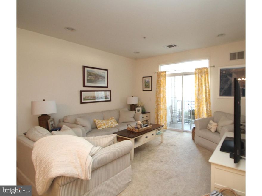 Enjoy low maintenance living! This gorgeous, Keswick style condo includes one deeded garage parking spot! Step right into the gourmet kitchen which features granite counter tops, a breakfast bar, stainless steel appliances and recessed lighting. A spacious dining nook is located right off the kitchen providing the perfect spot to entertain guests. Washer & Dryer is conveniently located in the unit ? no hauling laundry through the halls and is located in the small hallway leading back to the hallway bath! A built-in desk is great to utilize as a folding table or home office spot. Continue into the sun drenched living room with access to the patio. Patio provides a small storage closet. The master bedroom comes complete with large walk-in closet, a second sliding closet and master bath with soaking tub. The roomy guest bedroom also provides tons of closet space and private access to the hall bath. The location is incredible! Easily walk to Fayette Street's restaurants, shops and nightlife. Train station and bus nearby and direct access to the running trail is out back! In-ground pool is the perfect place to spend your warm summer weekends and outdoor entertaining areas can be used well into Fall. In house fitness center is located in the third building. Carpets will be replaced prior to new tenant move-in. Contact us today to schedule a showing on this beautiful condo!