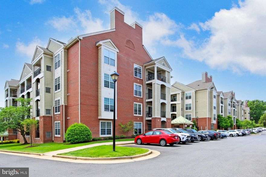 Welcome home to your top floor, privately located corner home.  As you enter, hardwood floors  greet you and usher you into almost 1100 sq. ft. of contemporary living. This spacious open floor plan offers hardwood flooring throughout with two primary suites with two full en-suite baths and loads of closet space, a walk in closet in the true primary bedroom.  The neutral paint palette is lit up by the large sliding glass door that accesses your balcony with additional storage, tree top views, as well as seasonal views of the pool, clubhouse and pond. Back inside you can enjoy the light filled living room with cathedral ceiling and gas fireplace and entertain easily with a dining area that accommodates a large table and chairs for hosting friends and family.  The renovated kitchen complete with stainless steel appliances, 42" Maple cabinets and granite countertops is sure to delight the chef in the family. A full-sized stack washer and dryer set competes the home. You’ll find your little oasis to be the perfect fit in a pet friendly community.  You will have two parking decals and plenty of visitor parking, elevator access, an outdoor pool, and a tranquil pond and trails. The association fees cover your water and gas bills in addition to parking, common area maintenance, landscaping, trash removal, snow removal, bike room, exterior building maintenance, balcony maintenance, the community center, pool, the pond and walking/jogging path. Conveniently located near King St. metro, major thoroughfares and great restaurants and shops. Come see all this amazing community which is just minutes from Old Town, Del Ray, the future Amazon HQ, and D.C. has to offer.