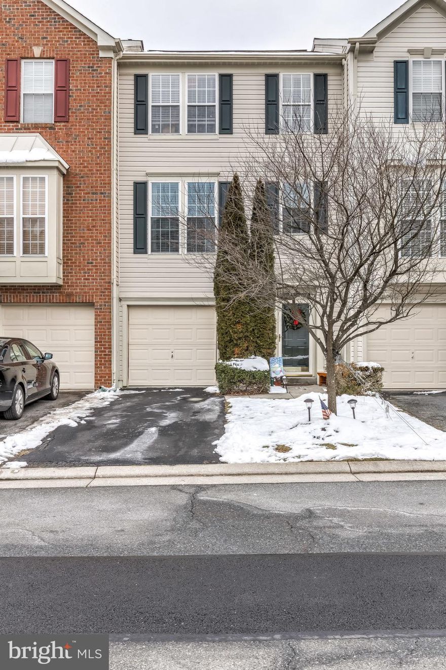 Fantastic garage townhome with THREE level bump out.  Recently remodeled kitchen with new tile floor, granite, & SS appliances.  Large deck off of family/sun room that backs to nature filled wooded area.  Master suite with walk in closet and master super bath.  Everything is neutral and move in ready.